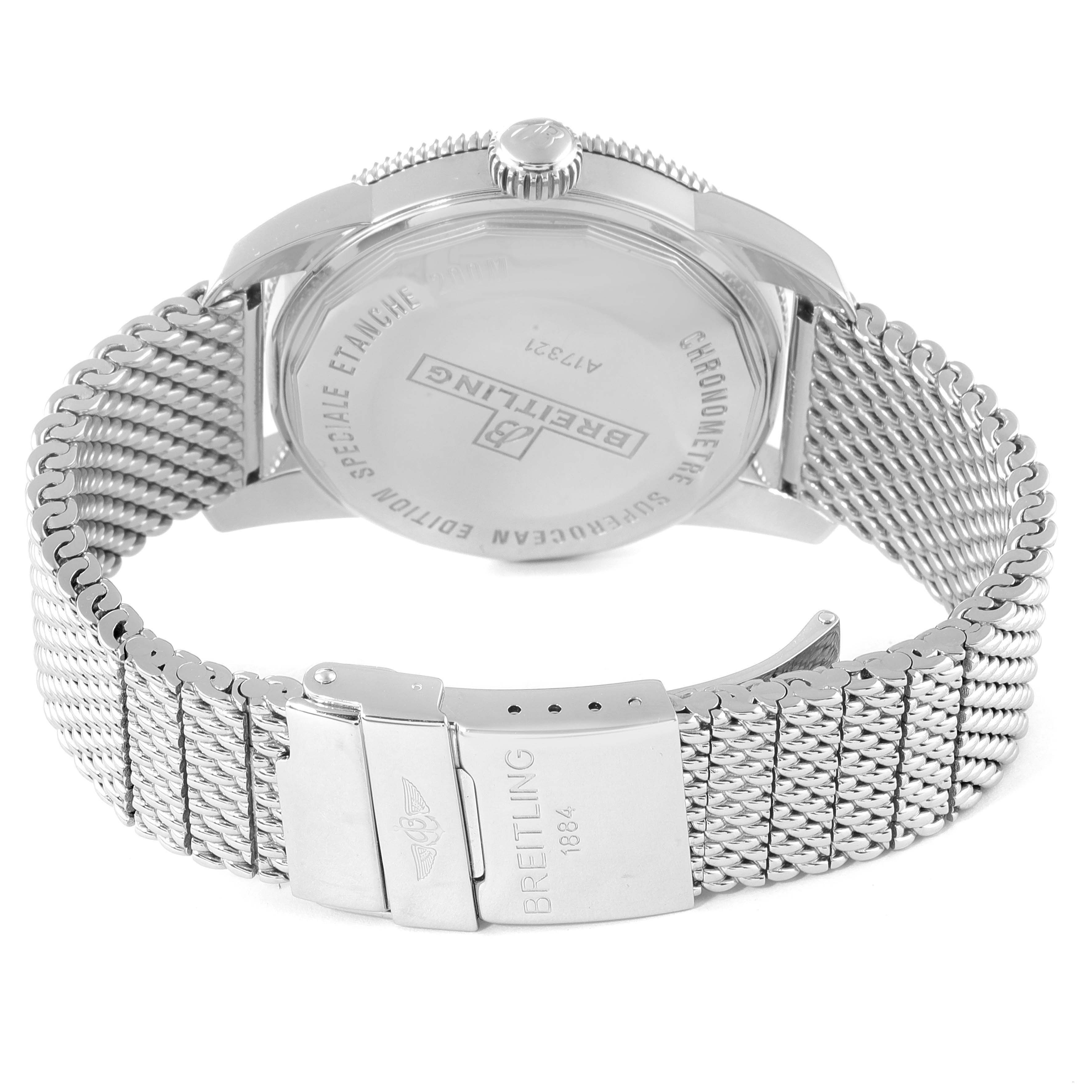 The image shows the back and side of a Breitling Superocean A17321 Men
s Stainless Steel Black Dial A17321 Men
s Stainless Steel Black Dial watch, focusing on its mesh strap and clasp.