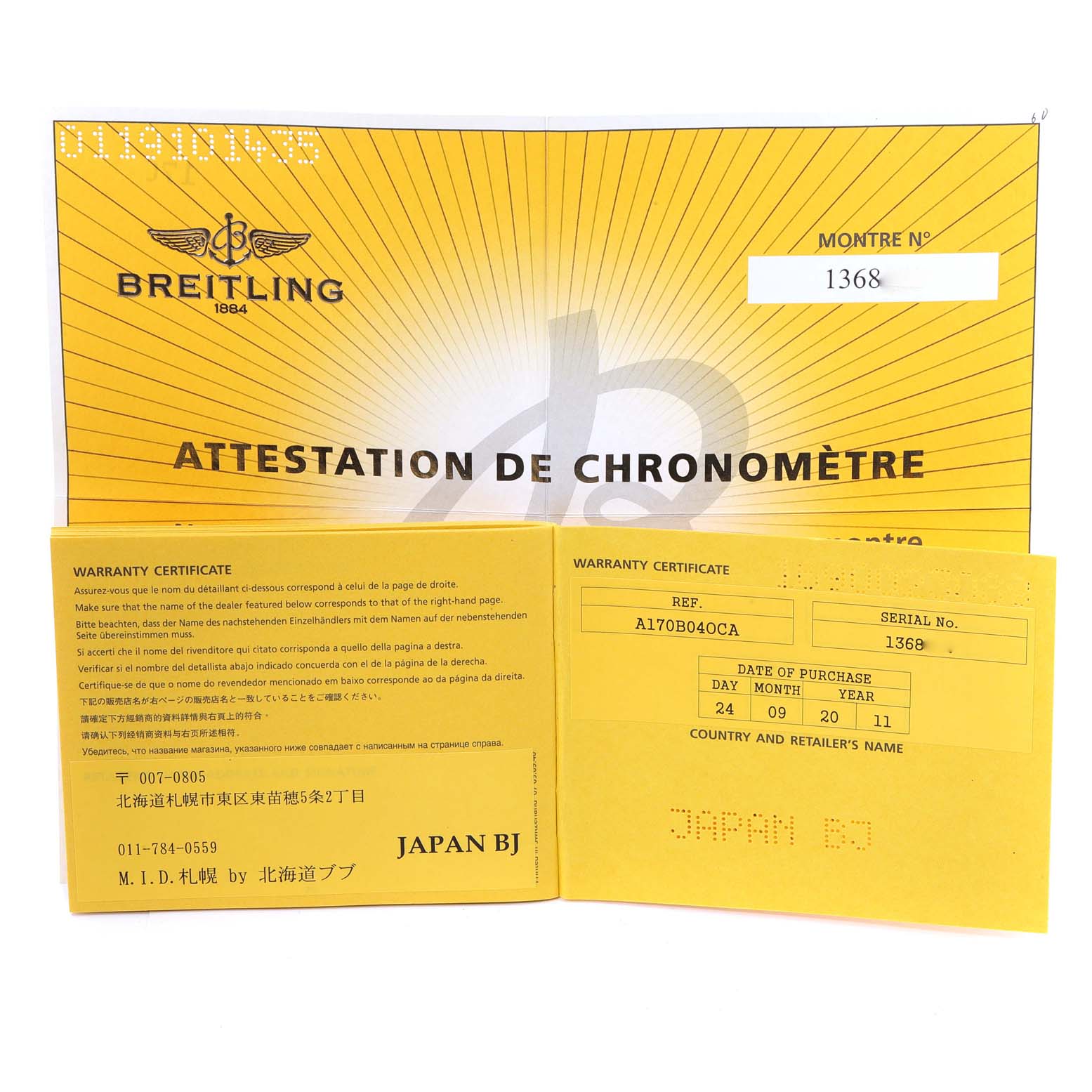 This image shows the warranty certificate and chronometer attestation for the Breitling Superocean A17321 Men
s Stainless Steel Black Dial A17321 Men
s Stainless Steel Black Dial model.