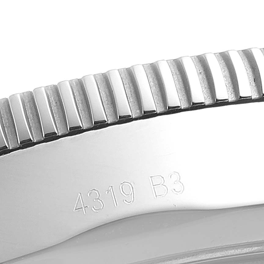 This image shows a close-up side view of the bezel and casing with engraving on a Breitling Superocean AB202016-C961-152A Men
s Stainless Steel Blue Dial AB202016-C961-152A Men
s Stainless Steel Blue Dial watch.