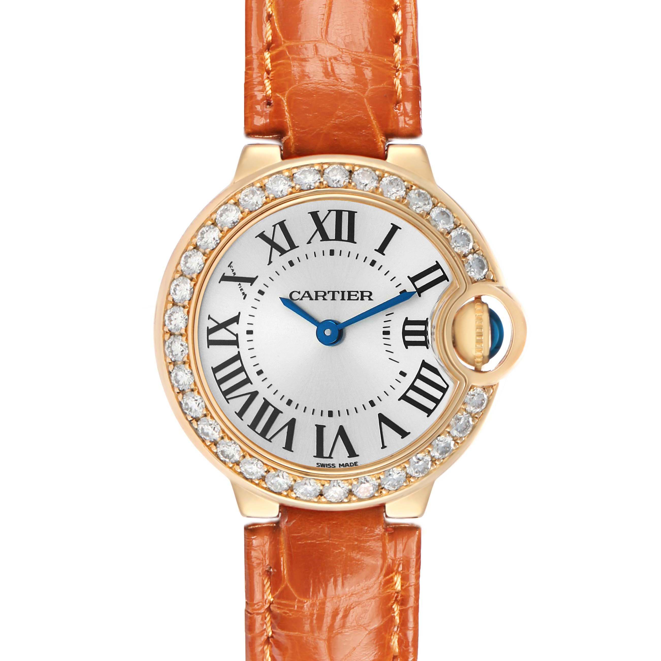 The Cartier Ballon Bleu WE900151 Women's Yellow Gold Silver Dial watch is shown from the front, highlighting the face, diamond-set bezel, and leather strap.