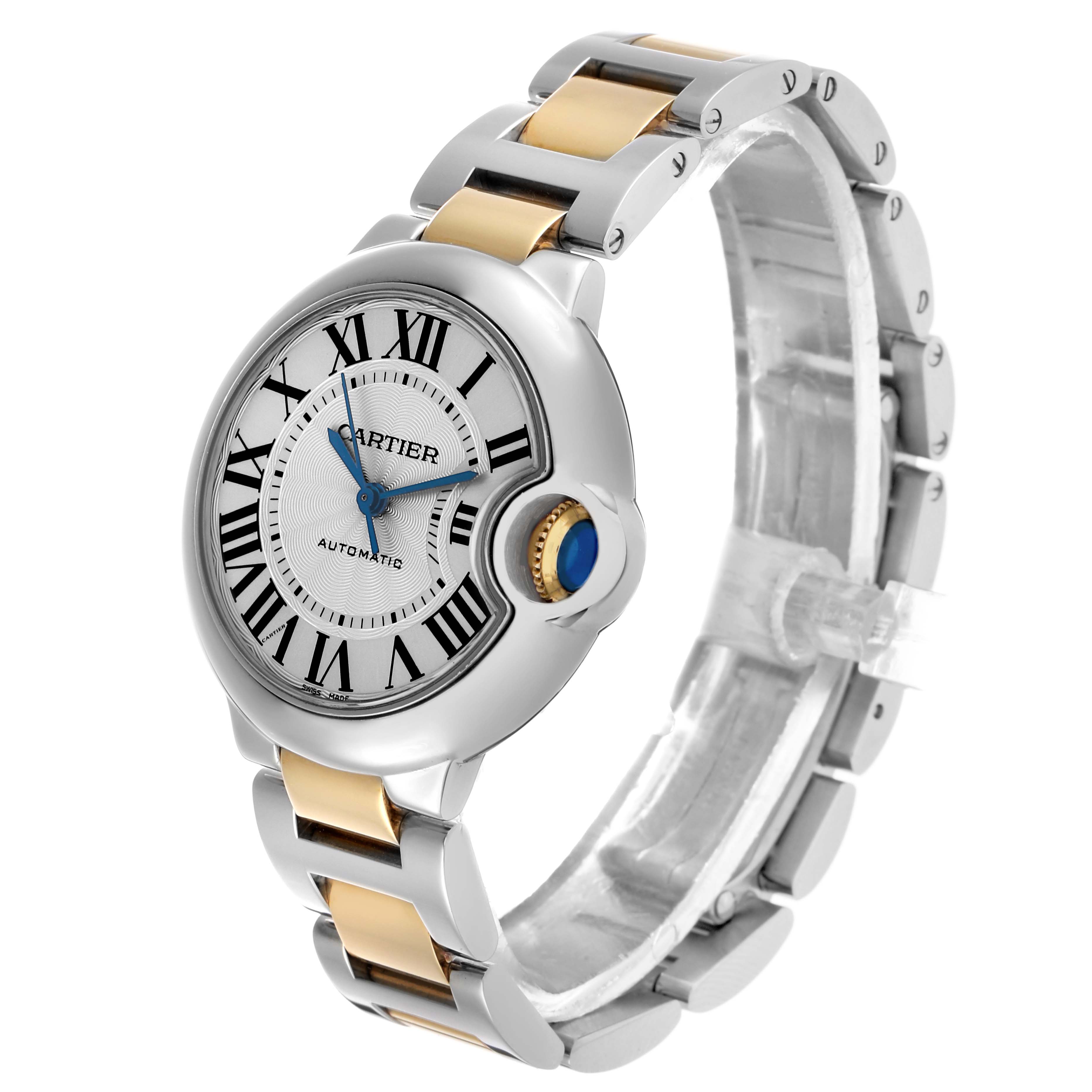 The Cartier Ballon Bleu W2BB0002 Women's Steel and Gold (two tone) Silver Dial watch is shown at a three-quarter angle, highlighting its dial, crown, and bimetallic bracelet.