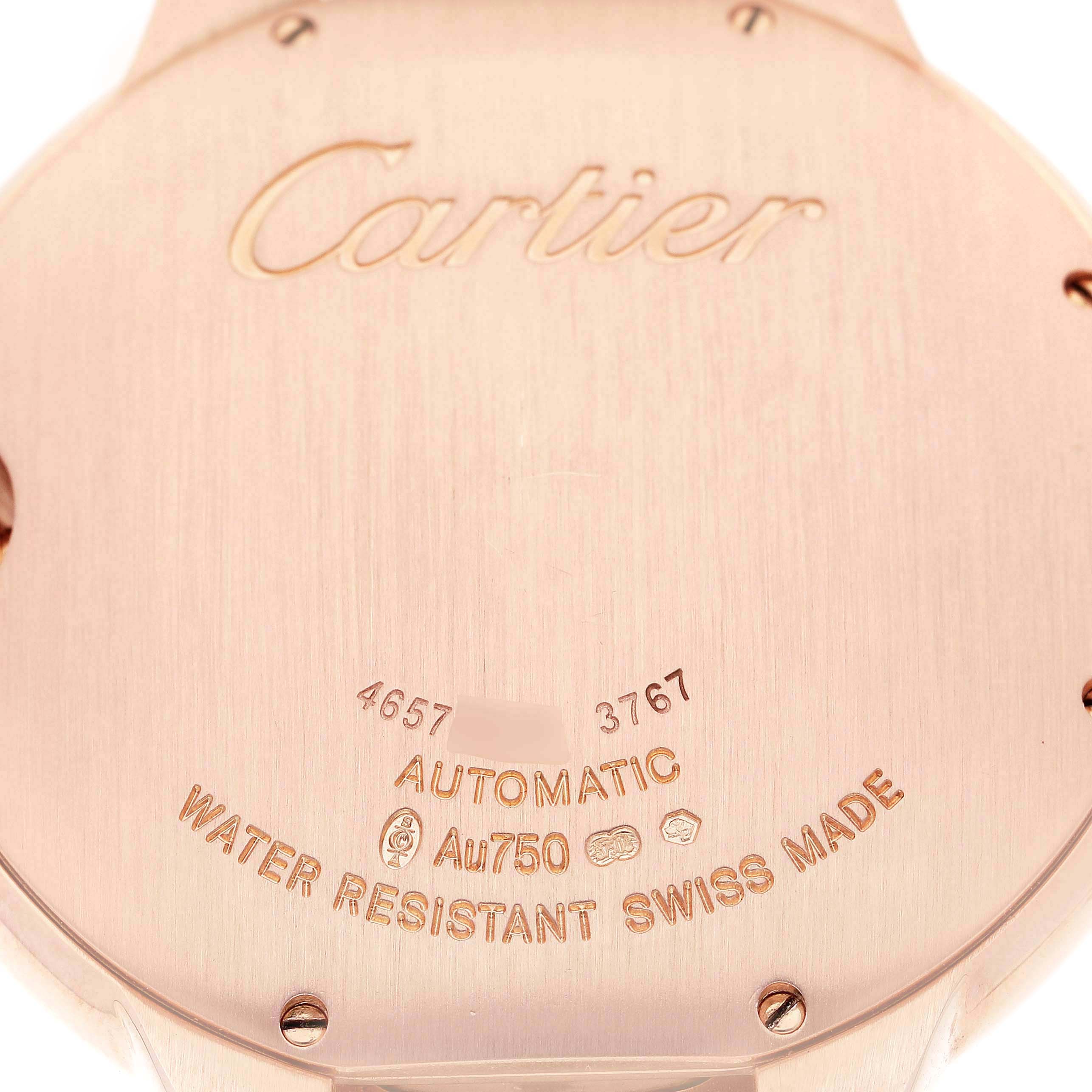 The image shows the back of a Cartier Ballon Bleu W69006Z2 Men
s Rose Gold Silver Dial watch, highlighting engravings and material details.