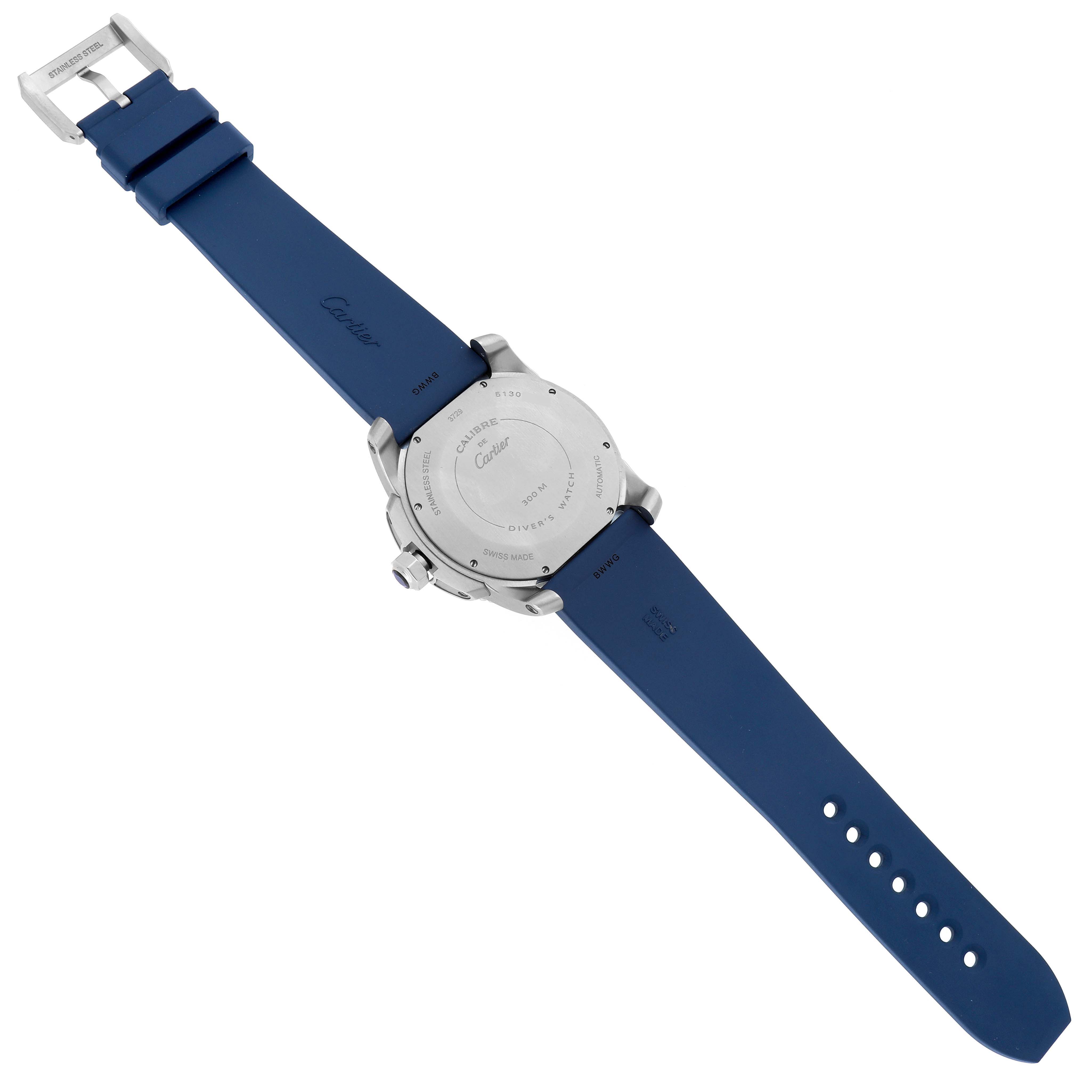 The image shows the back of a Calibre de Cartier watch, featuring its case back and blue strap.