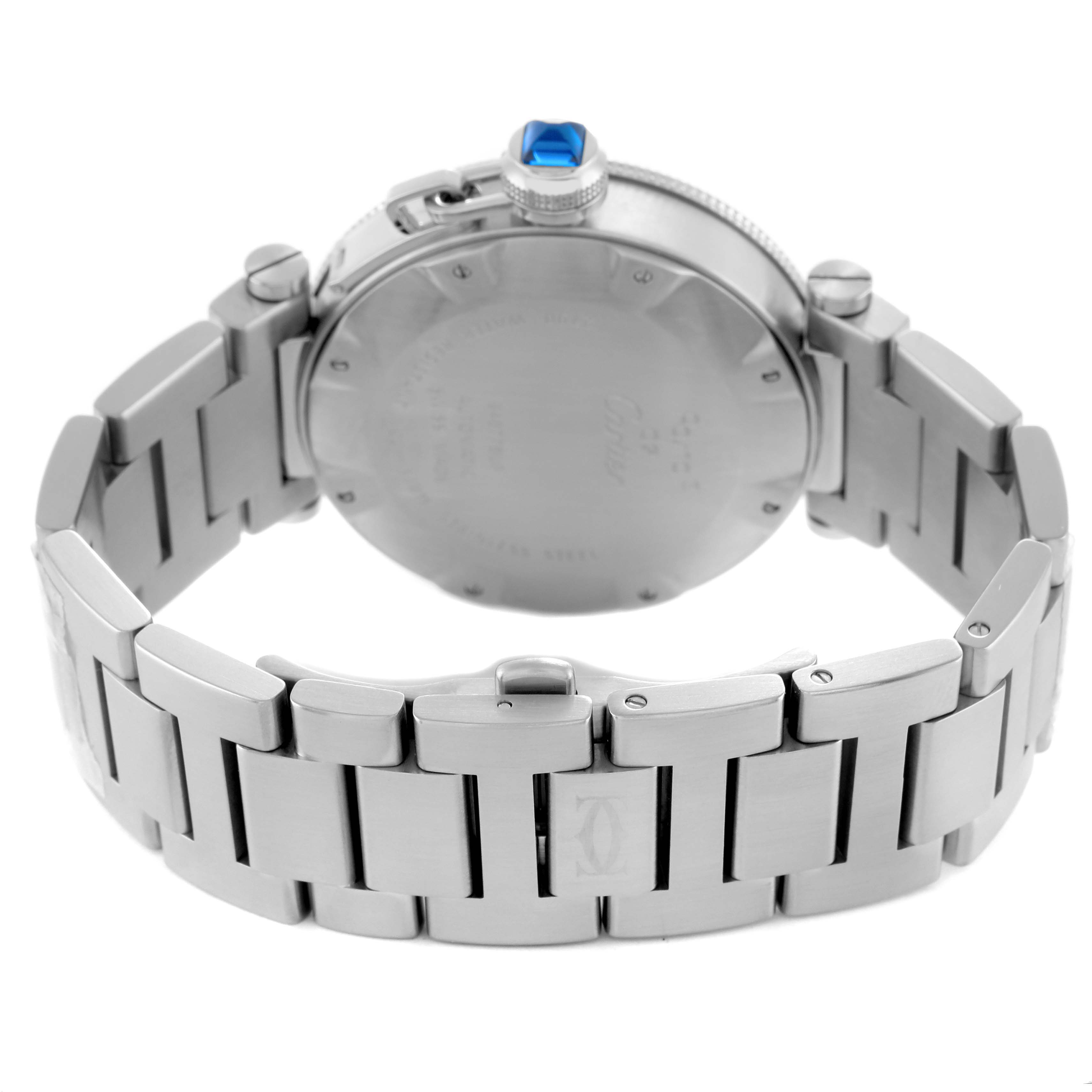 The image shows the back of the Calibre de Cartier watch by Cartier, highlighting the bracelet and crown.