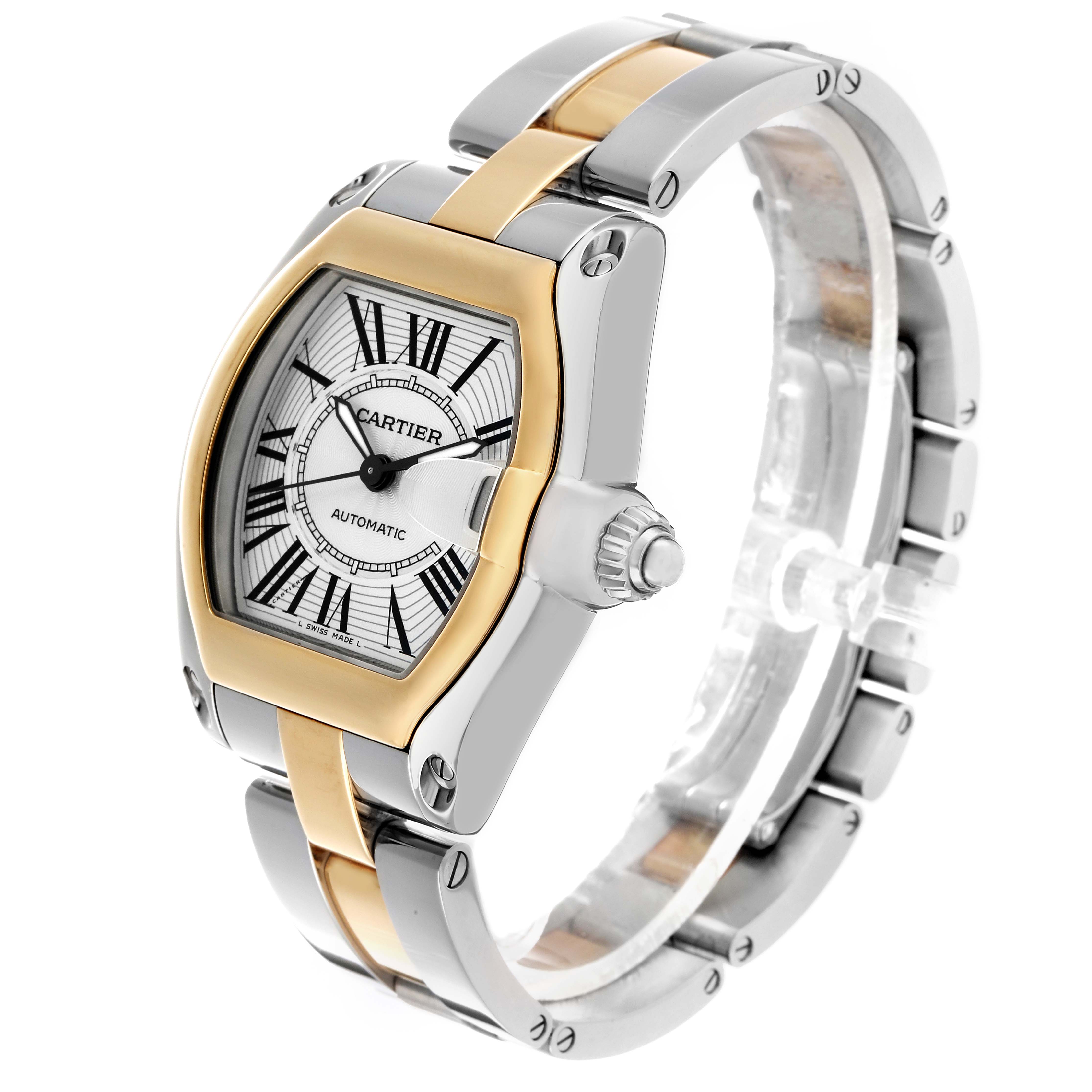 The Cartier Roadster W62031Y4 Men's Steel and Gold (two tone) Silver Dial watch is shown at an angle highlighting the face, crown, and two-tone bracelet.