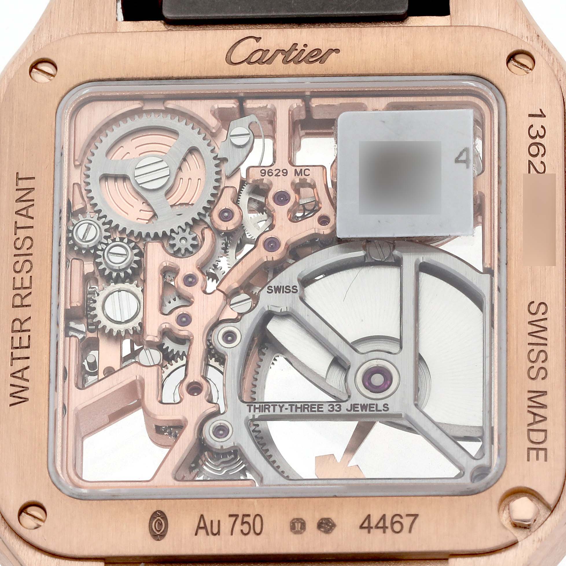 The image shows the back of a Cartier Santos Dumont WHSA0030 Men's Rose Gold Transparent Dial watch, revealing its intricate mechanical movement.