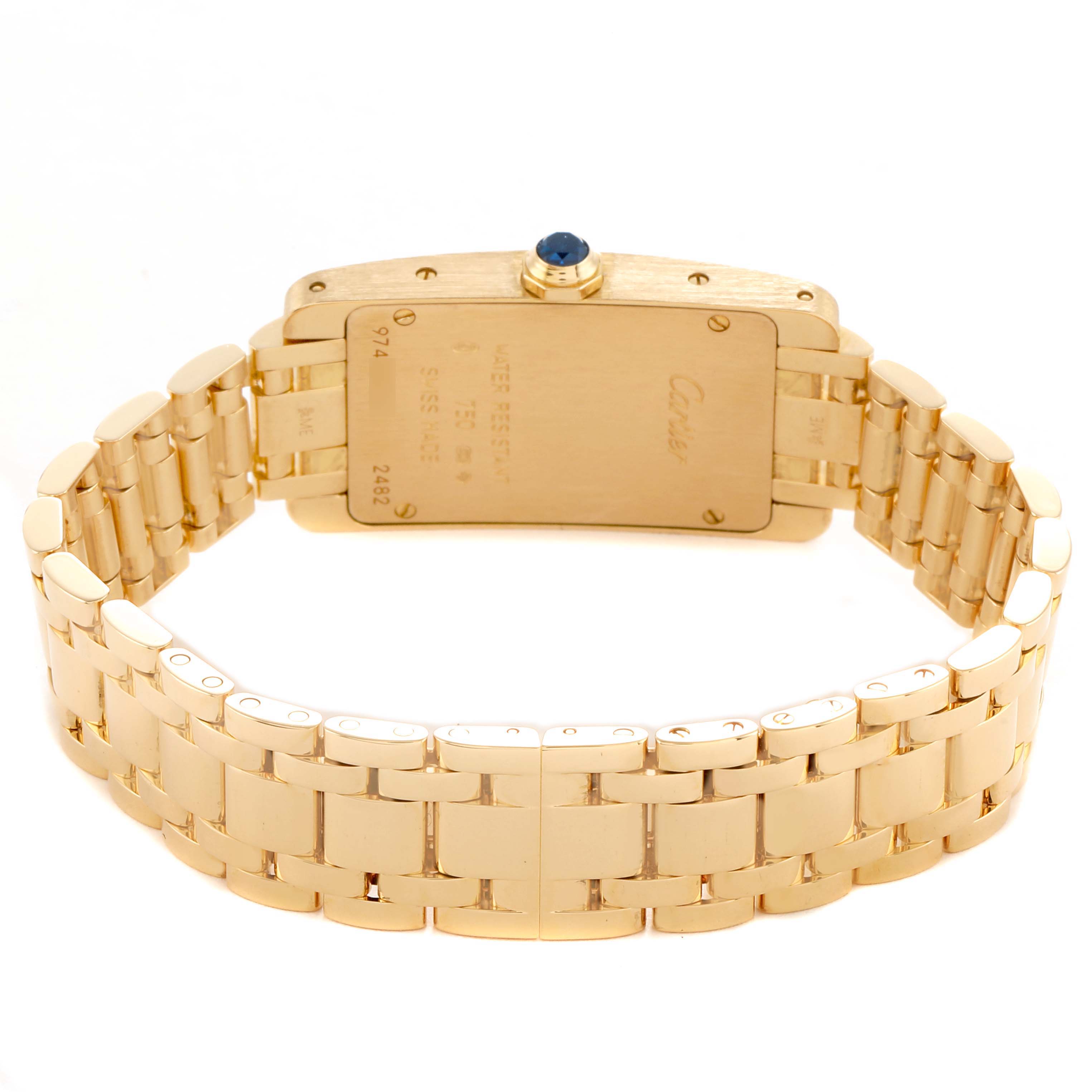 The Cartier Tank Americaine W26015K2 Women's Yellow Gold Silver Dial watch is shown from the back, highlighting its bracelet and case back details.