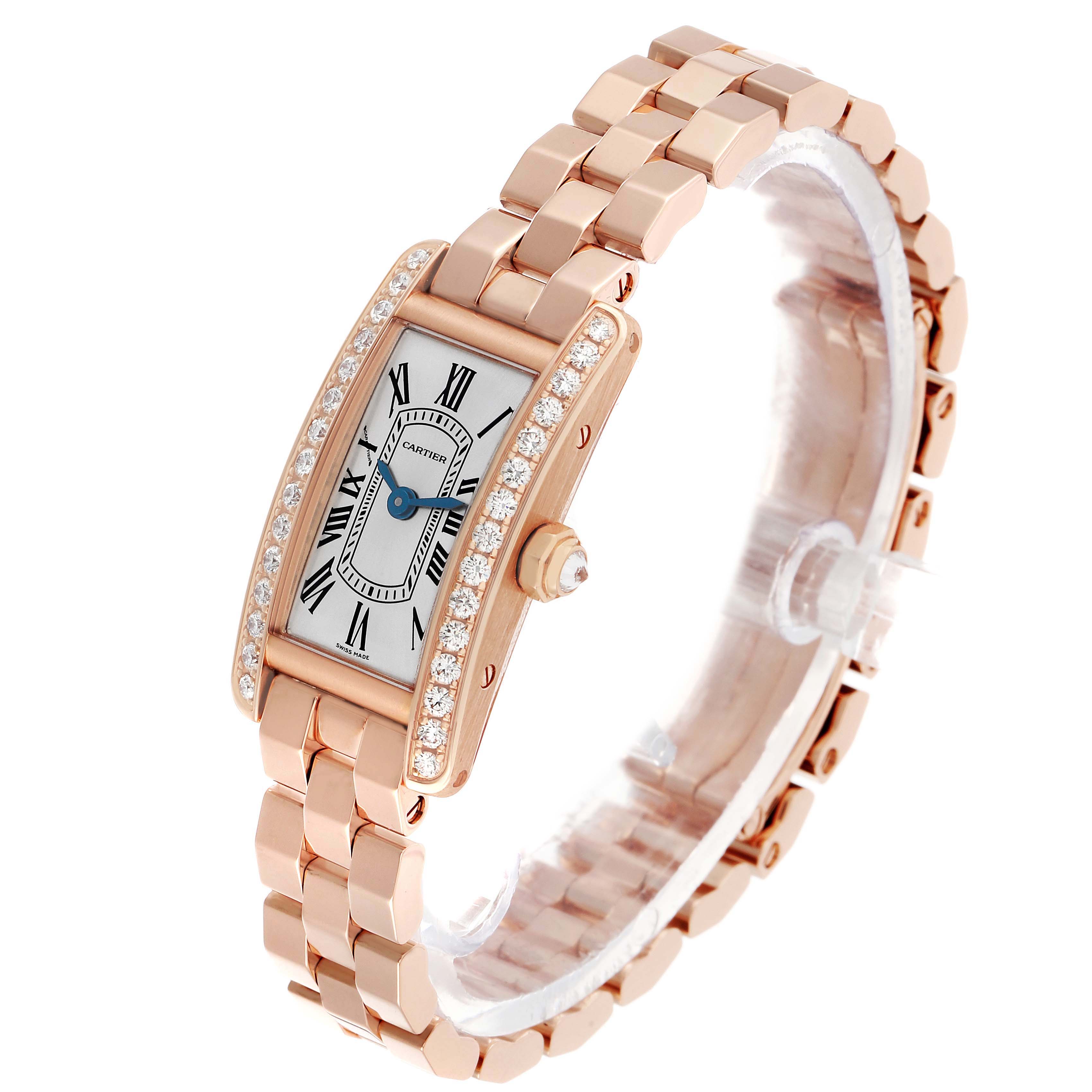 The Cartier Tank Americaine WJTA0043 Men's Rose Gold Silver Dial watch is shown at a slight angle, highlighting its rectangular face, diamond bezel, and link bracelet.
