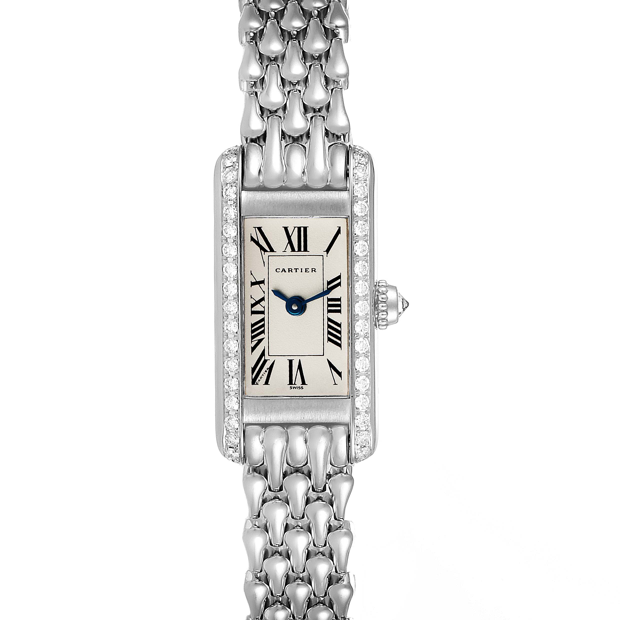This image shows a frontal view of a Cartier Tank Americaine 1381 Women's White Gold Silver Dial 1381 Women's White Gold Silver Dial watch with a rectangular face and metal bracelet.
