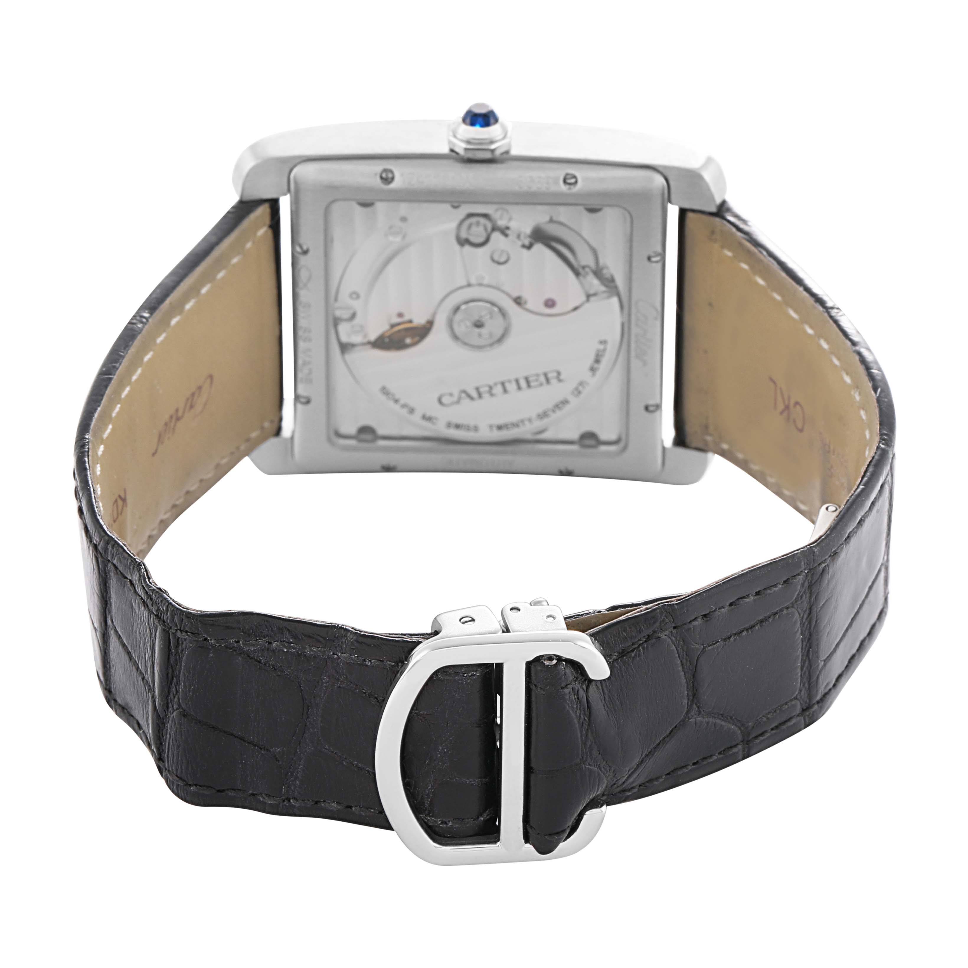 The image shows the back view of the Cartier Tank MC W5330004 Men's Stainless Steel Black Dial, revealing the movement through a transparent case back and a leather strap with a clasp.