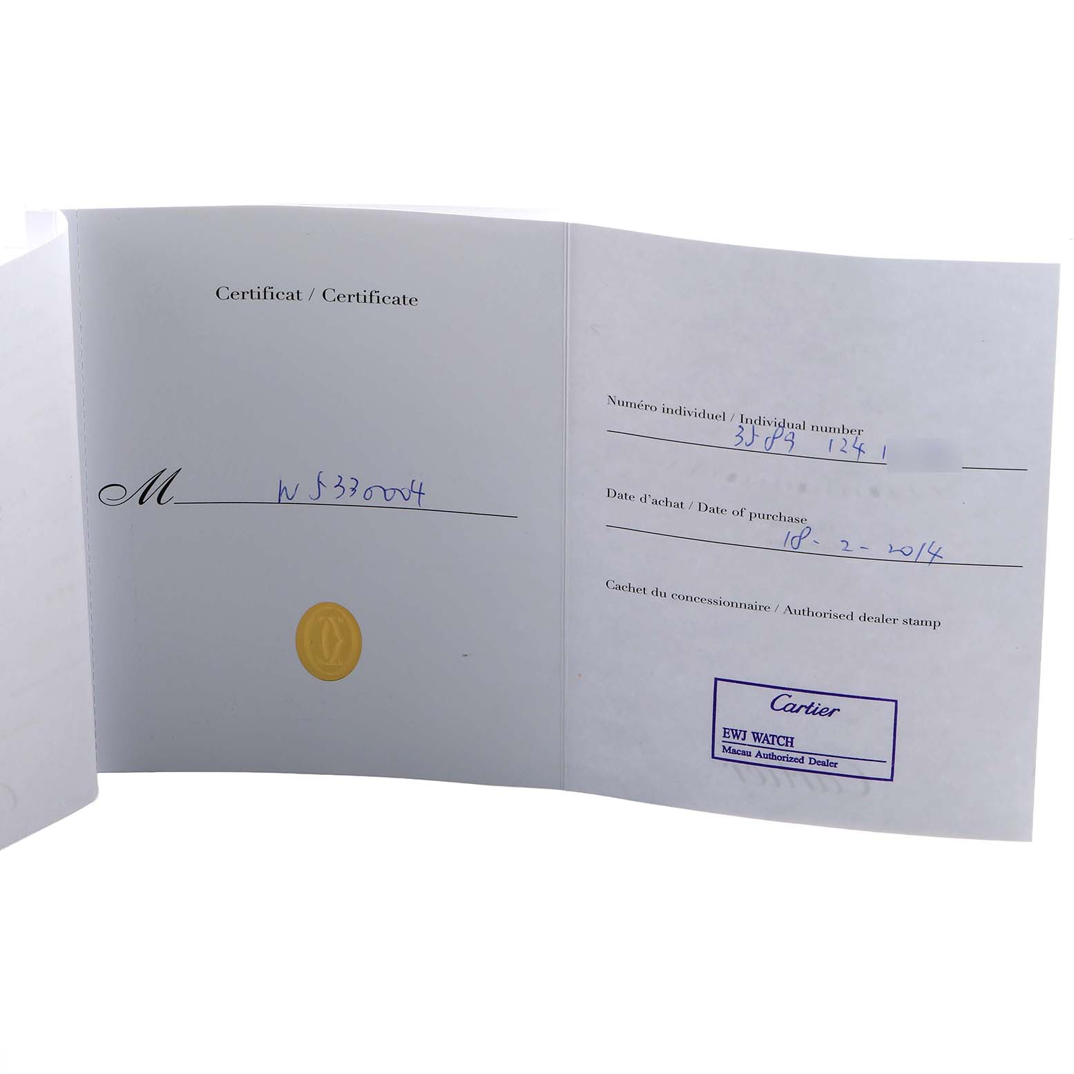 The image shows a certificate for the Cartier Tank MC W5330004 Men's Stainless Steel Black Dial watch, displaying purchase details and a dealer stamp.