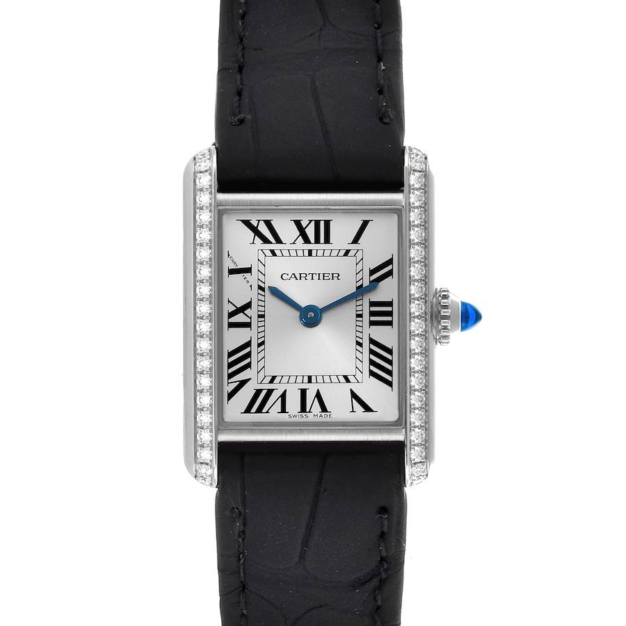 The Cartier Tank Must watch is shown from the front, highlighting the dial, black strap, bejeweled case, and blue crown.