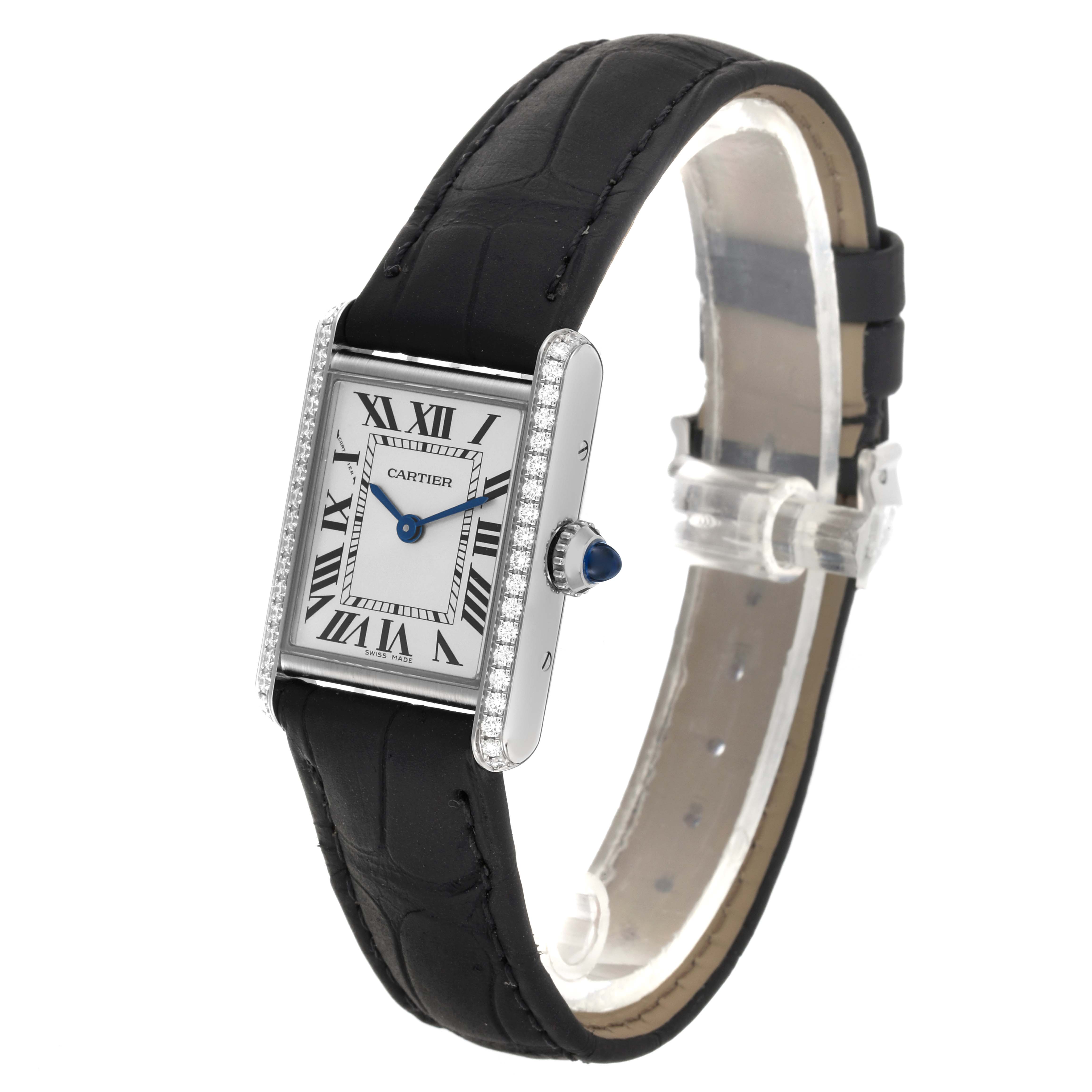 The Cartier Tank Must W4TA0016 Women
s Stainless Steel Silver Dial W4TA0016 Women
s Stainless Steel Silver Dial watch is shown at a slight side angle featuring the face, bezel, crown, and strap.