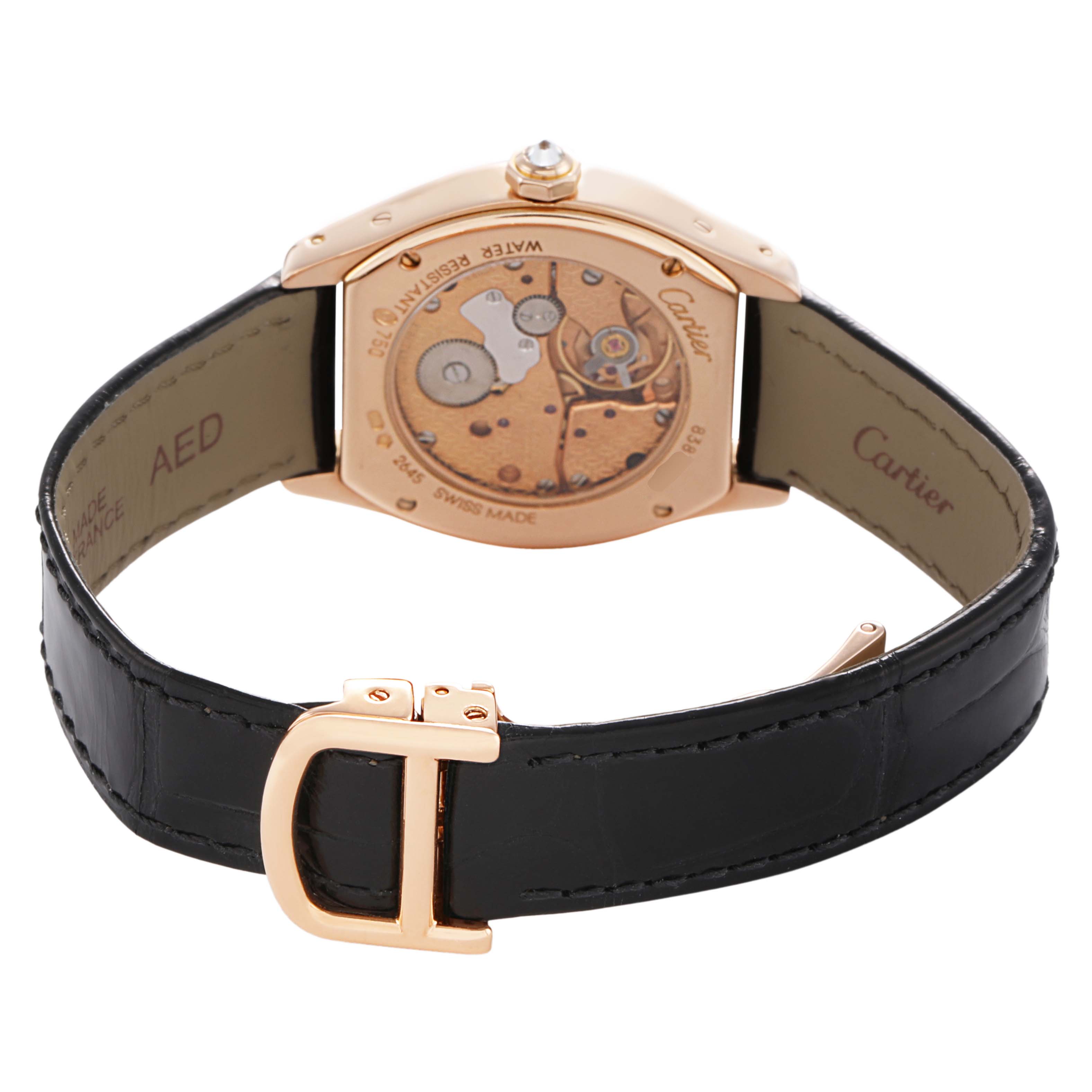 The Cartier Tortue WA507031 Women's Rose Gold Silver Dial watch is shown from the back, highlighting the movement and mechanism inside, with a clasp and strap visible.