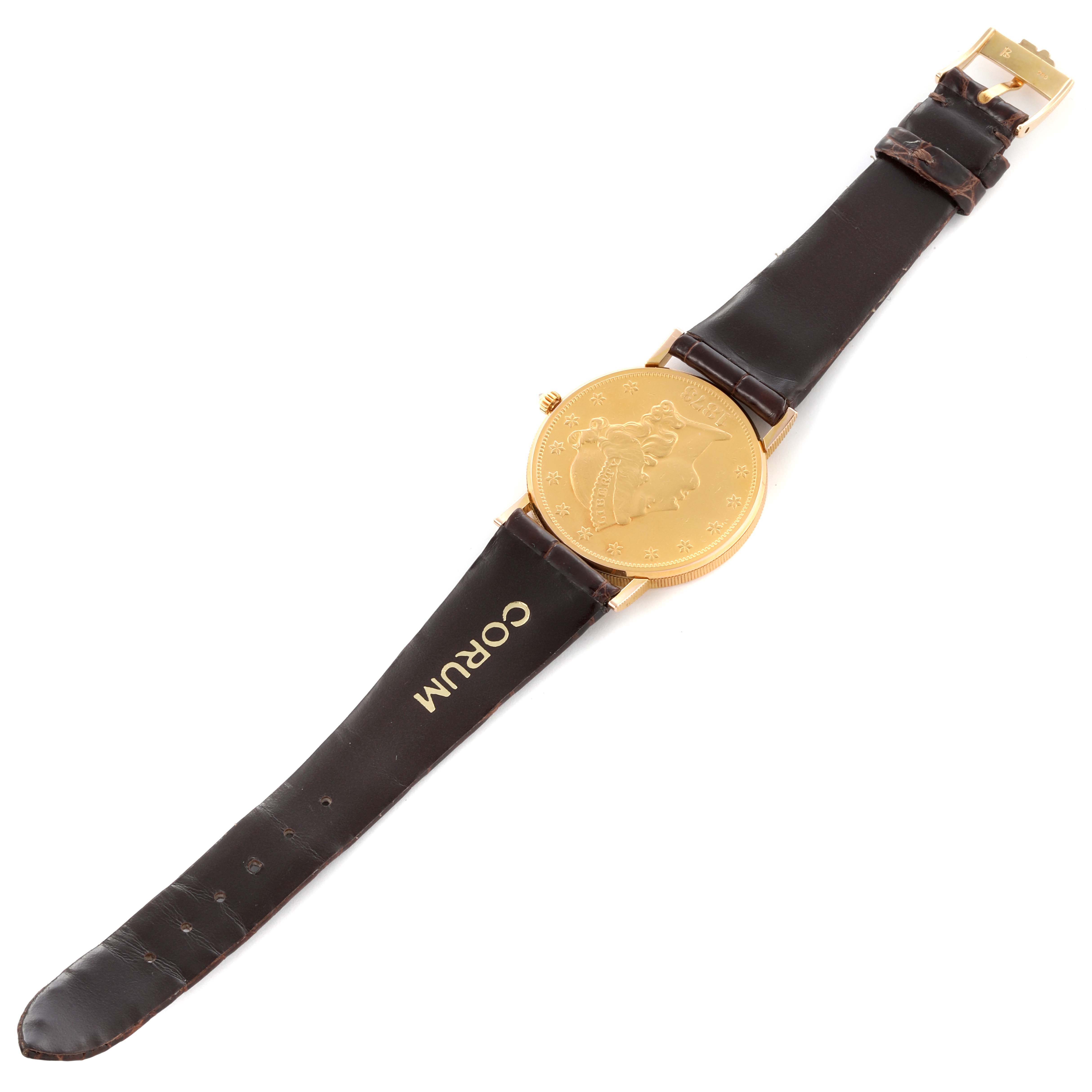 The image shows a Corum Coin Watch 4414556 Men's Yellow Gold Champagne Dial 4414556 Men's Yellow Gold Champagne Dial from a top-down angle, revealing the round gold face and leather strap.