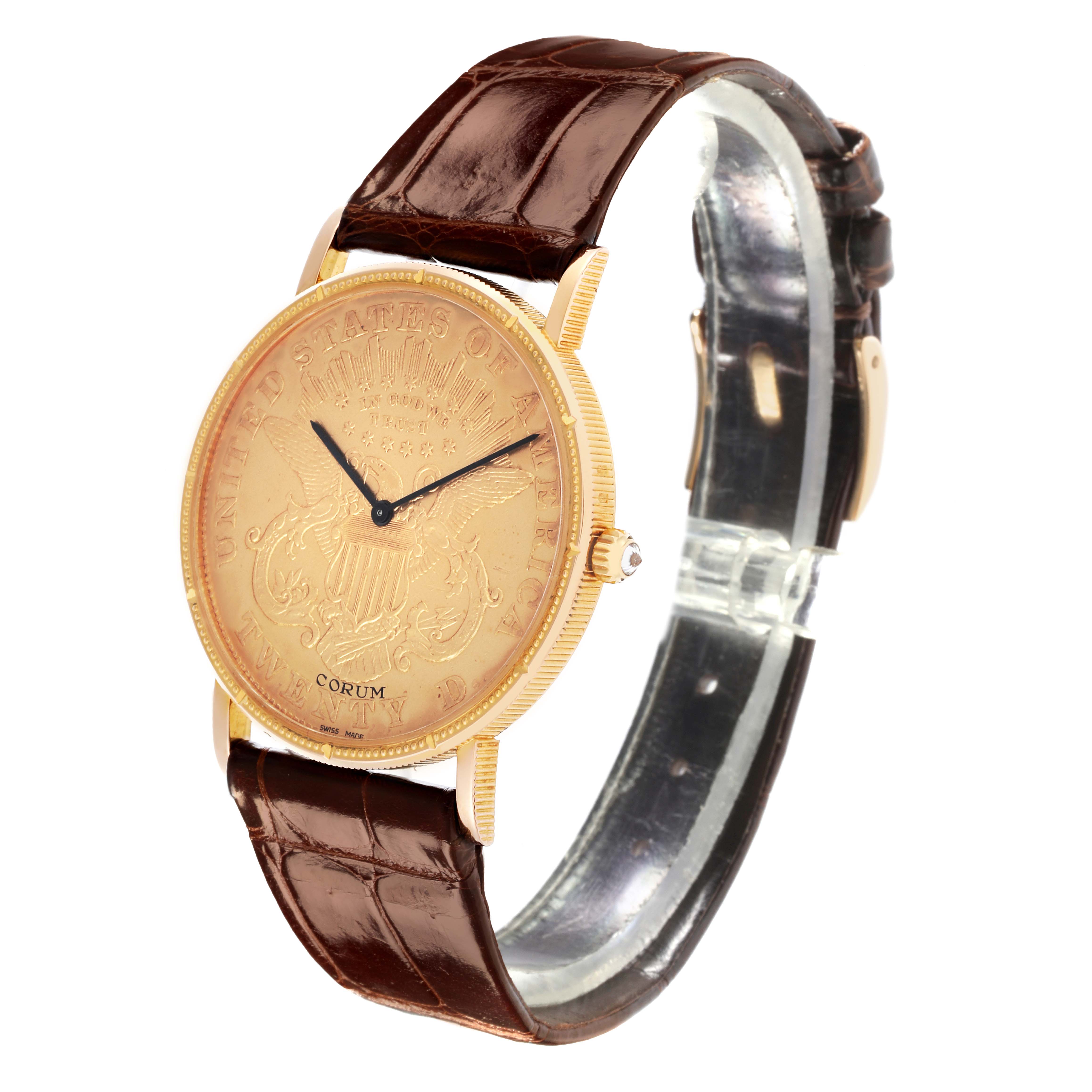 The Corum Coin Watch 4414556 Men's Yellow Gold Champagne Dial 4414556 Men's Yellow Gold Champagne Dial is shown from a front-side angle, displaying its face, gold bezel, and brown leather strap.