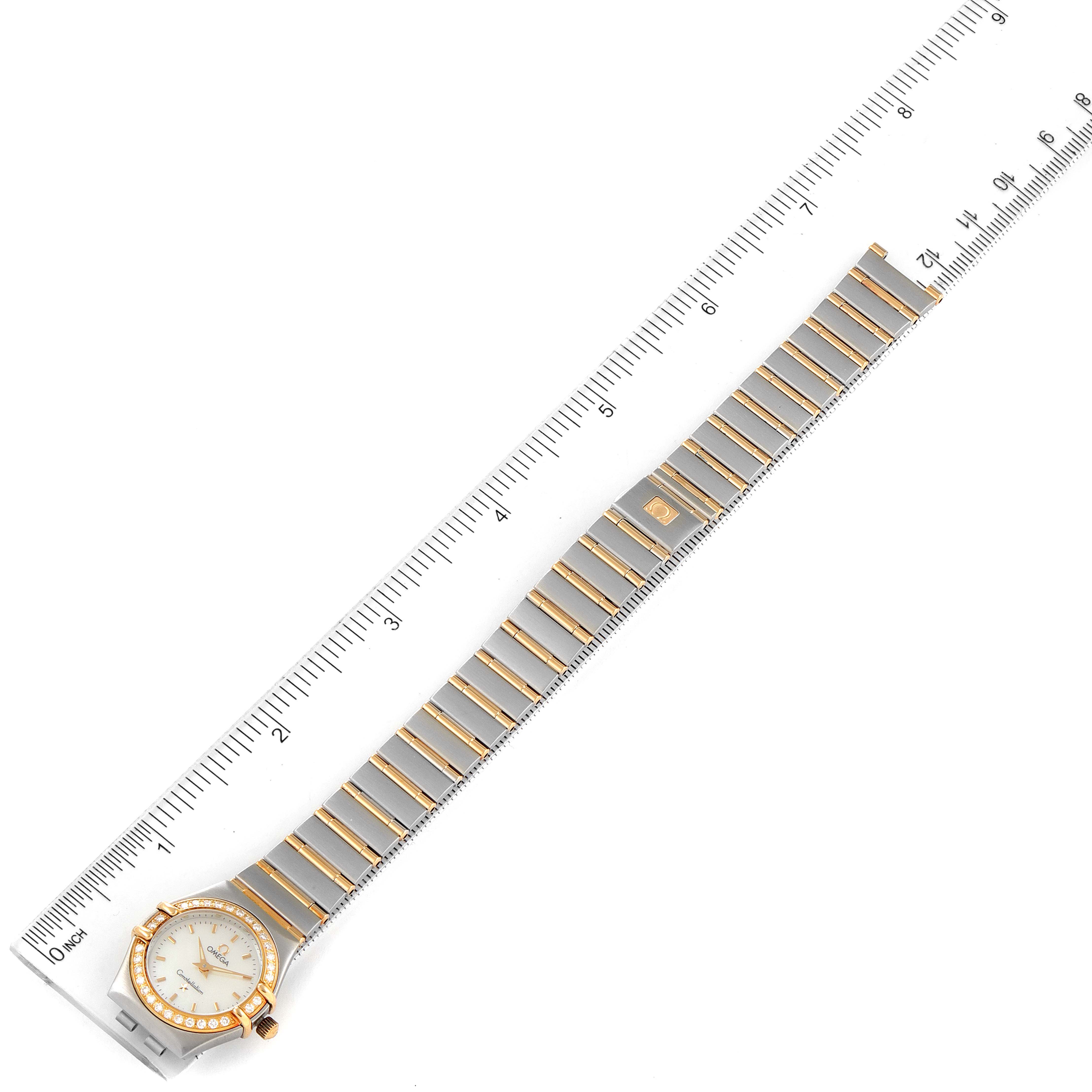 The Constellation Steel Yellow Gold MOP Diamond Ladies Watch 1267.70.00 by Omega 1267.70.00 Women's Steel and Gold (two tone) Mother of Pearl Dial 1267.70.00 Women's Steel and Gold (two tone) Mother of Pearl Dial is shown flat with the entire band and face visible.