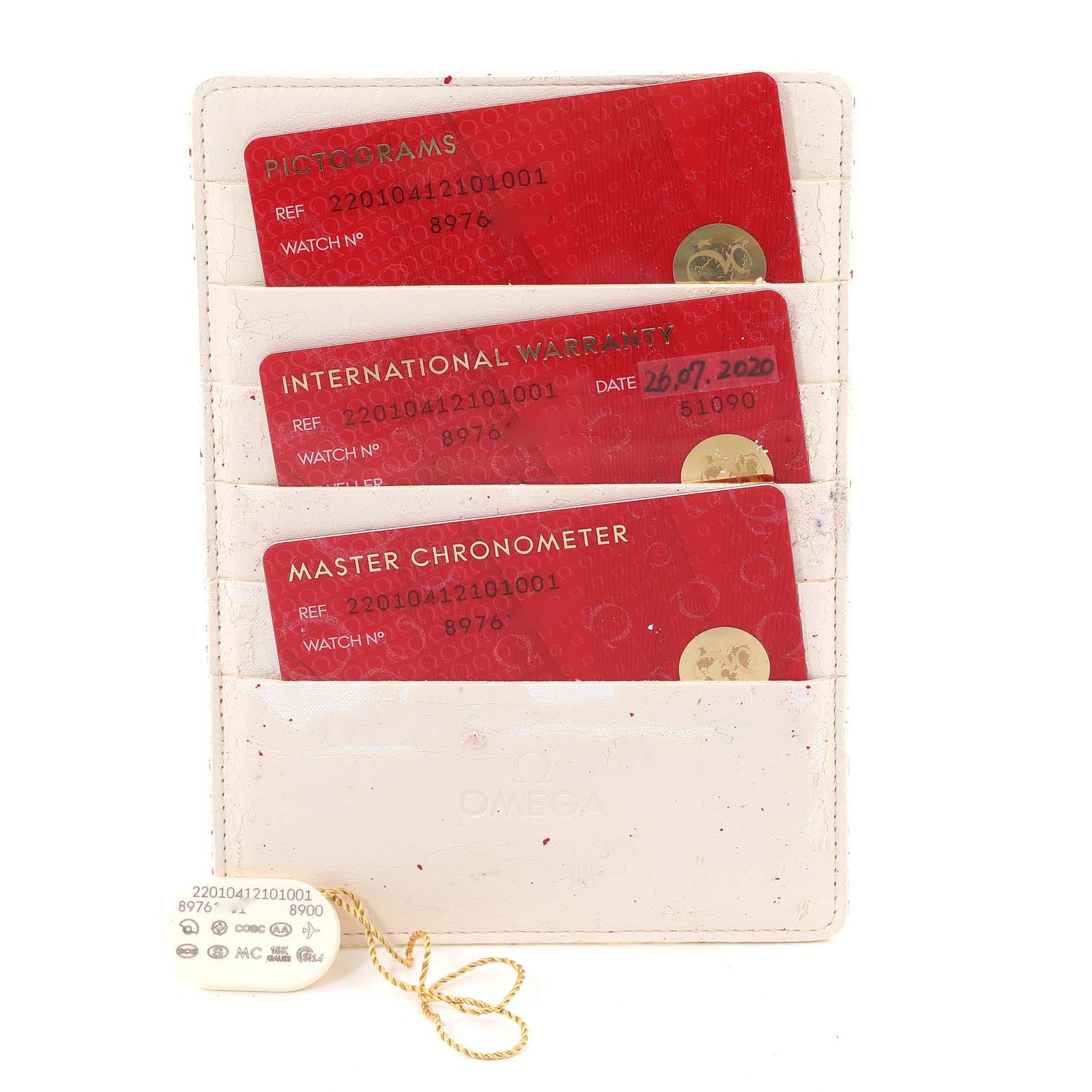 The image shows the certification cards and tag for the Omega Aqua Terra 220.10.41.21.01.001 Men's Stainless Steel Black Dial 220.10.41.21.01.001 Men's Stainless Steel Black Dial model watch.