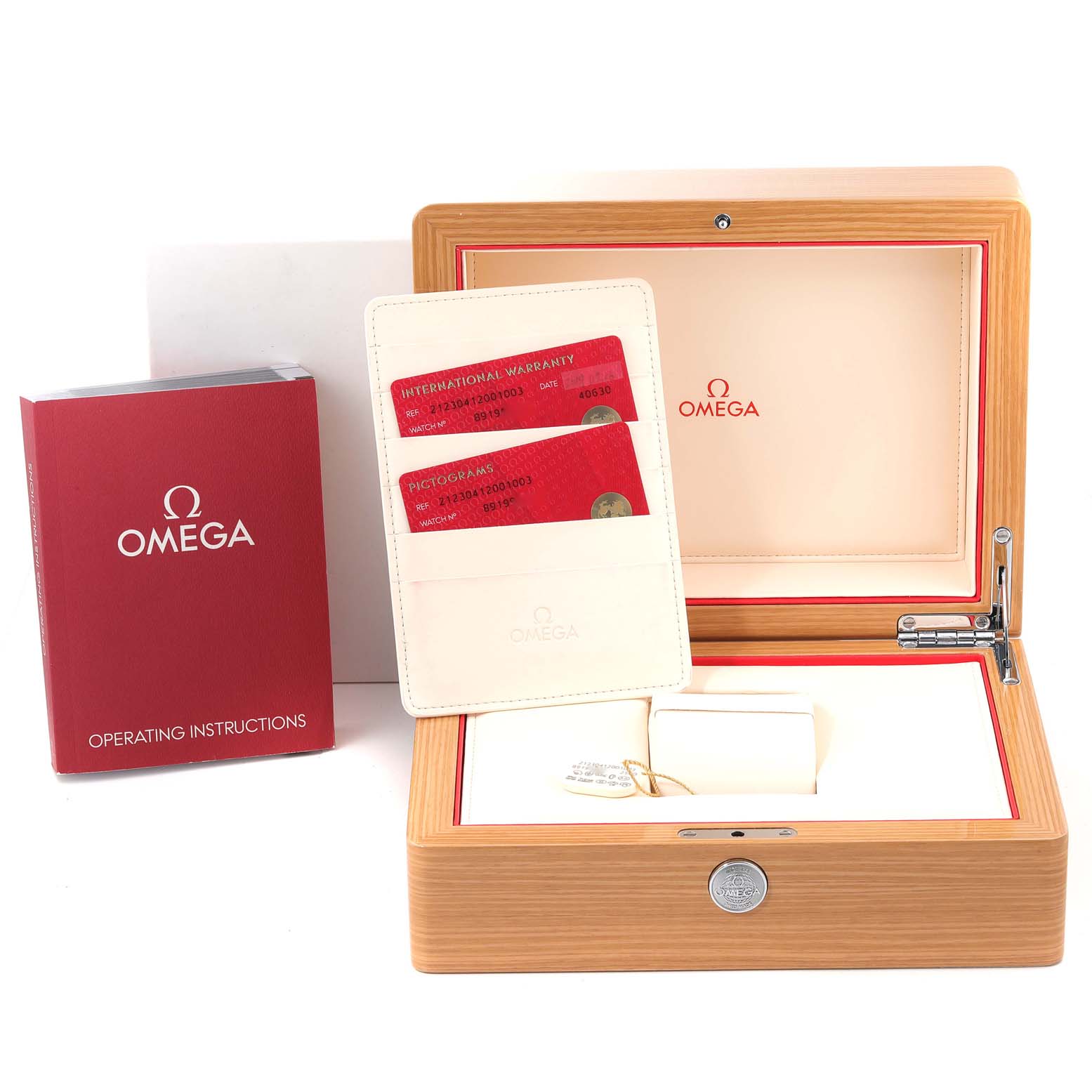 The image displays the packaging and accessories of an Omega Seamaster 212.30.41.20.01.003 Men's Stainless Steel Black Dial 212.30.41.20.01.003 Men's Stainless Steel Black Dial, including the box, international warranty cards, and operating instructions book.
