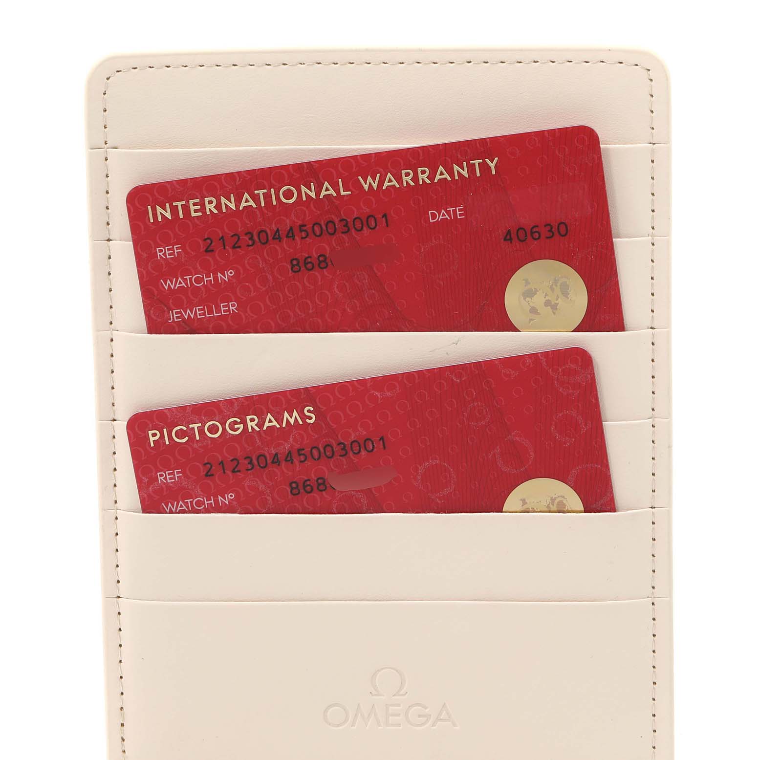 The image shows the International Warranty and Pictograms cards for the Omega Seamaster 212.30.44.50.03.001 Men's Stainless Steel Blue Dial 212.30.44.50.03.001 Men's Stainless Steel Blue Dial watch.