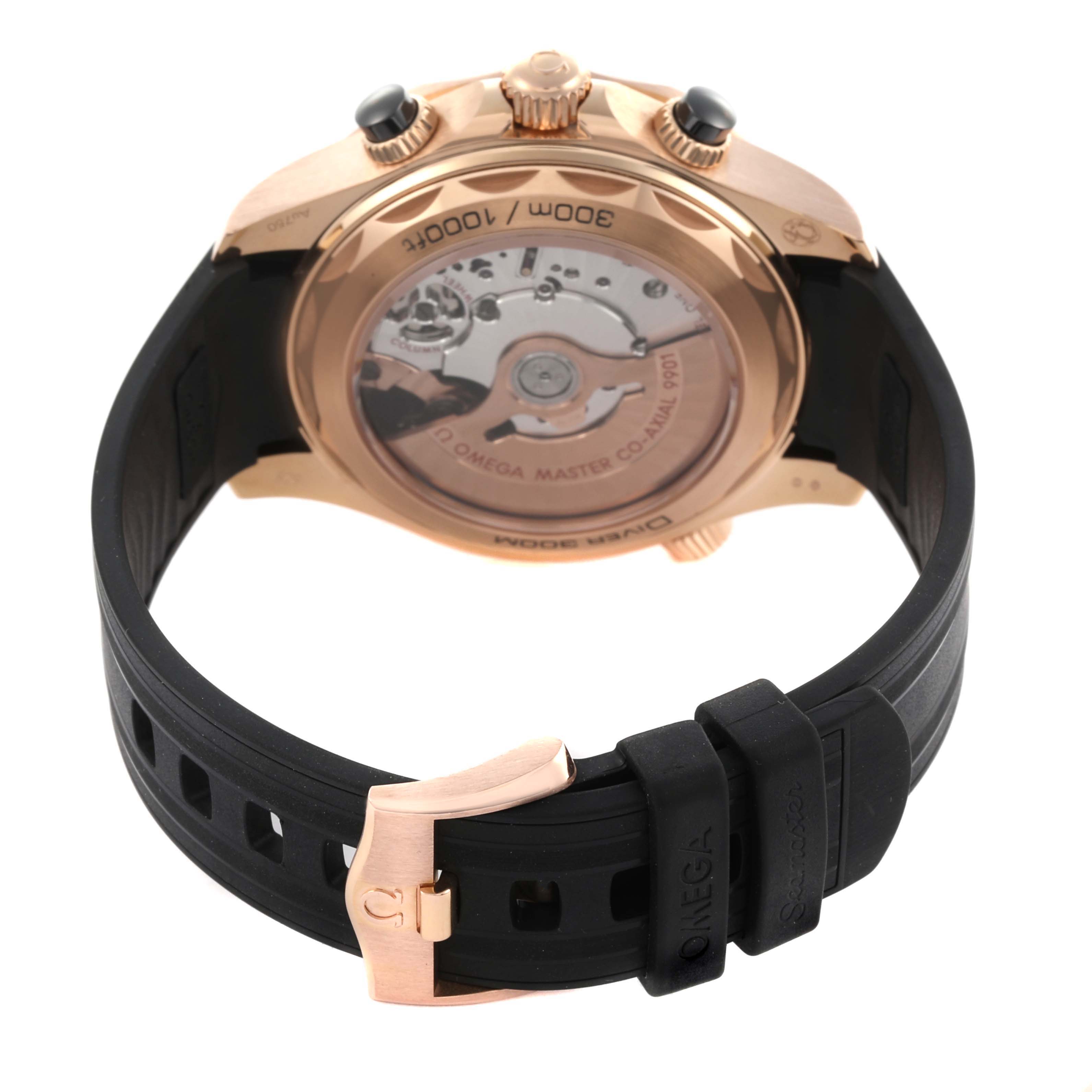 The image shows the back view of an Omega Seamaster 210.62.44.51.01.001 Men
s Rose Gold Black Dial 210.62.44.51.01.001 Men
s Rose Gold Black Dial watch, highlighting the case back, movement, and black strap with buckle.
