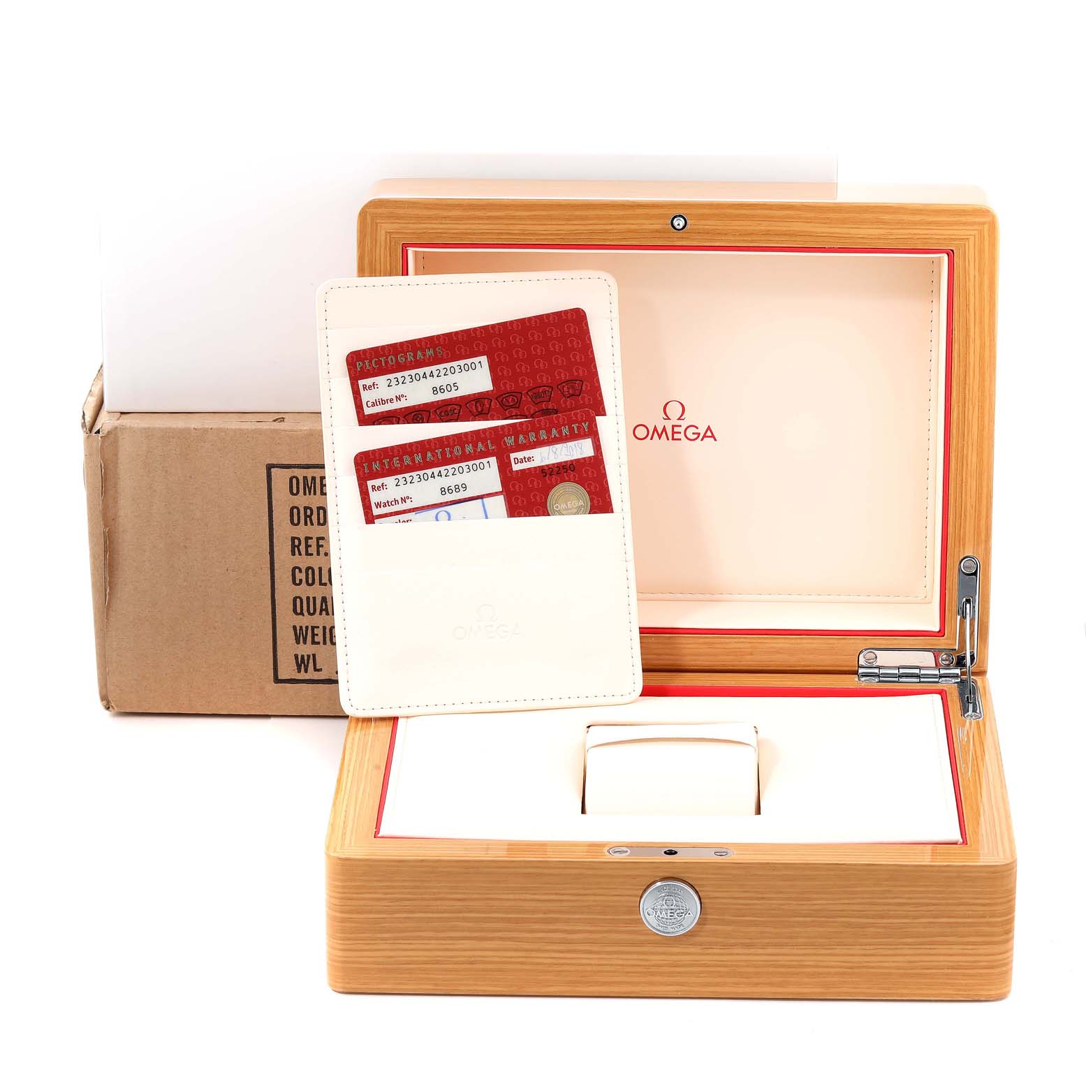 The image shows the opened box and warranty card for the Omega Planet Ocean 232.30.44.22.03.001 Men
s Stainless Steel Blue Dial 232.30.44.22.03.001 Men
s Stainless Steel Blue Dial watch, accompanied by packaging.