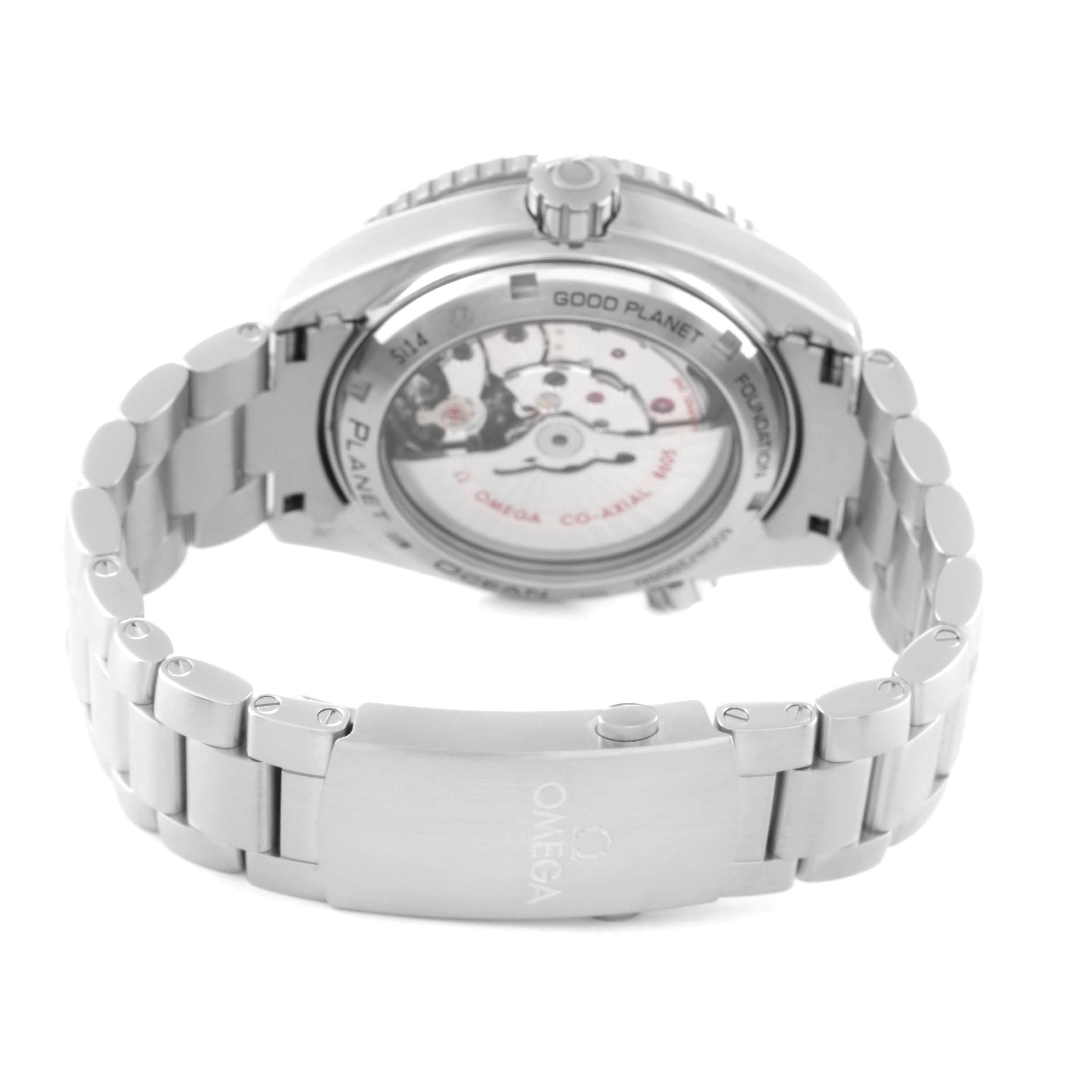 The image shows the back view of an Omega Planet Ocean 232.30.44.22.03.001 Men
s Stainless Steel Blue Dial 232.30.44.22.03.001 Men
s Stainless Steel Blue Dial watch, highlighting its transparent case back and stainless steel bracelet.