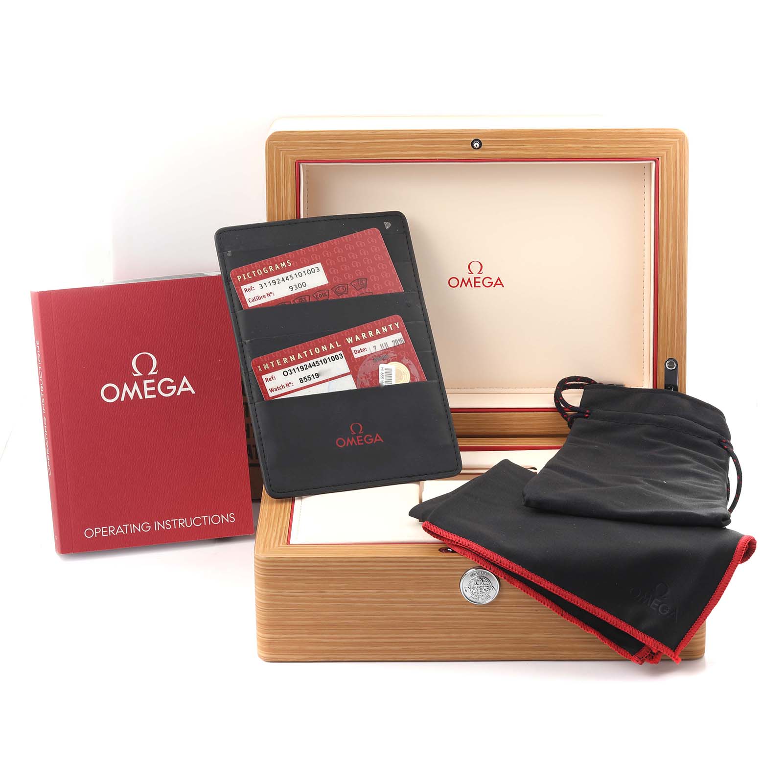 The image shows Omega Speedmaster 311.92.44.51.01.003 Men's Ceramic Black Dial 311.92.44.51.01.003 Men's Ceramic Black Dial accessories including a box, instruction manual, warranty cards, and pouches.