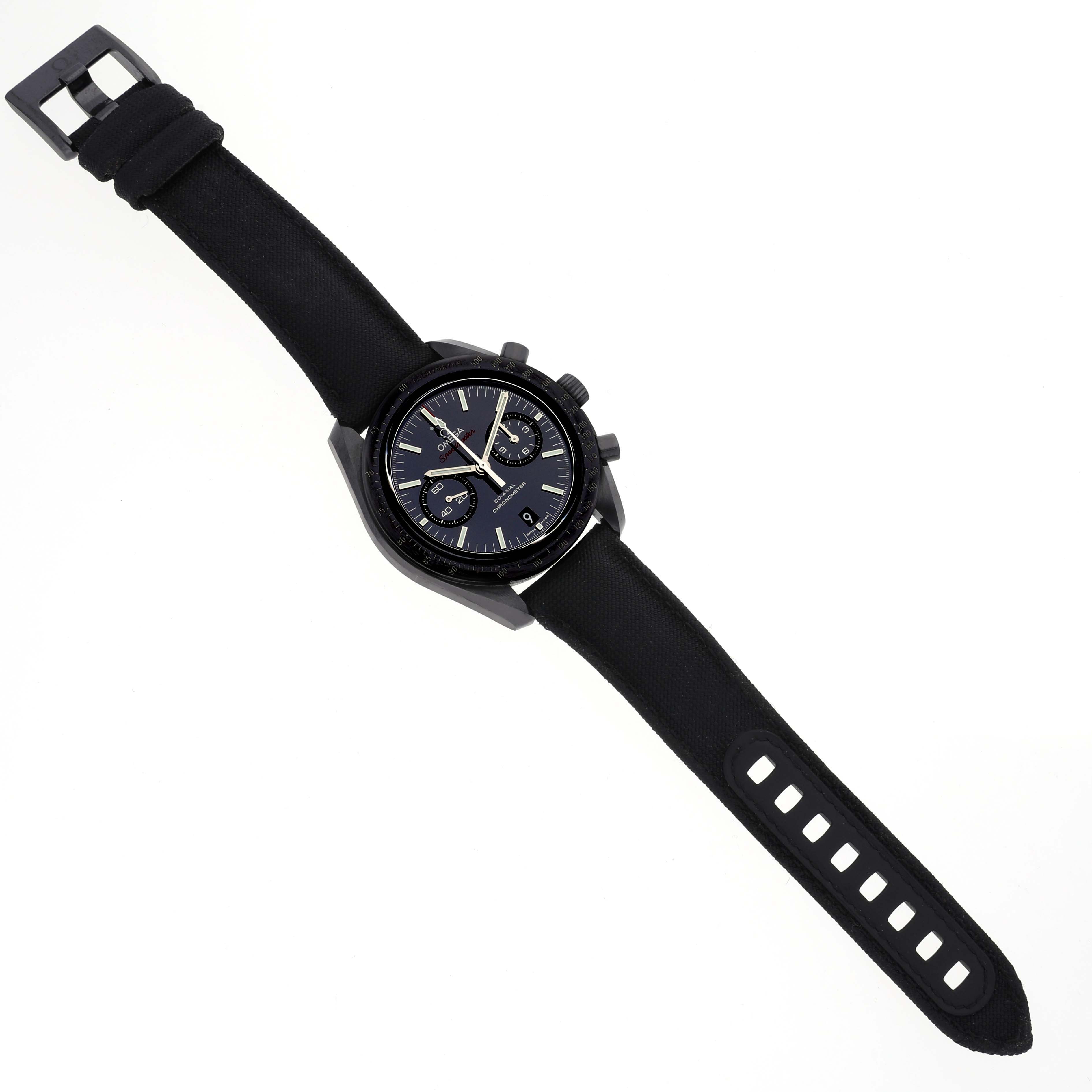 The Omega Speedmaster 311.92.44.51.01.003 Men's Ceramic Black Dial 311.92.44.51.01.003 Men's Ceramic Black Dial watch is shown from a top view, displaying the face, case, and entire strap.