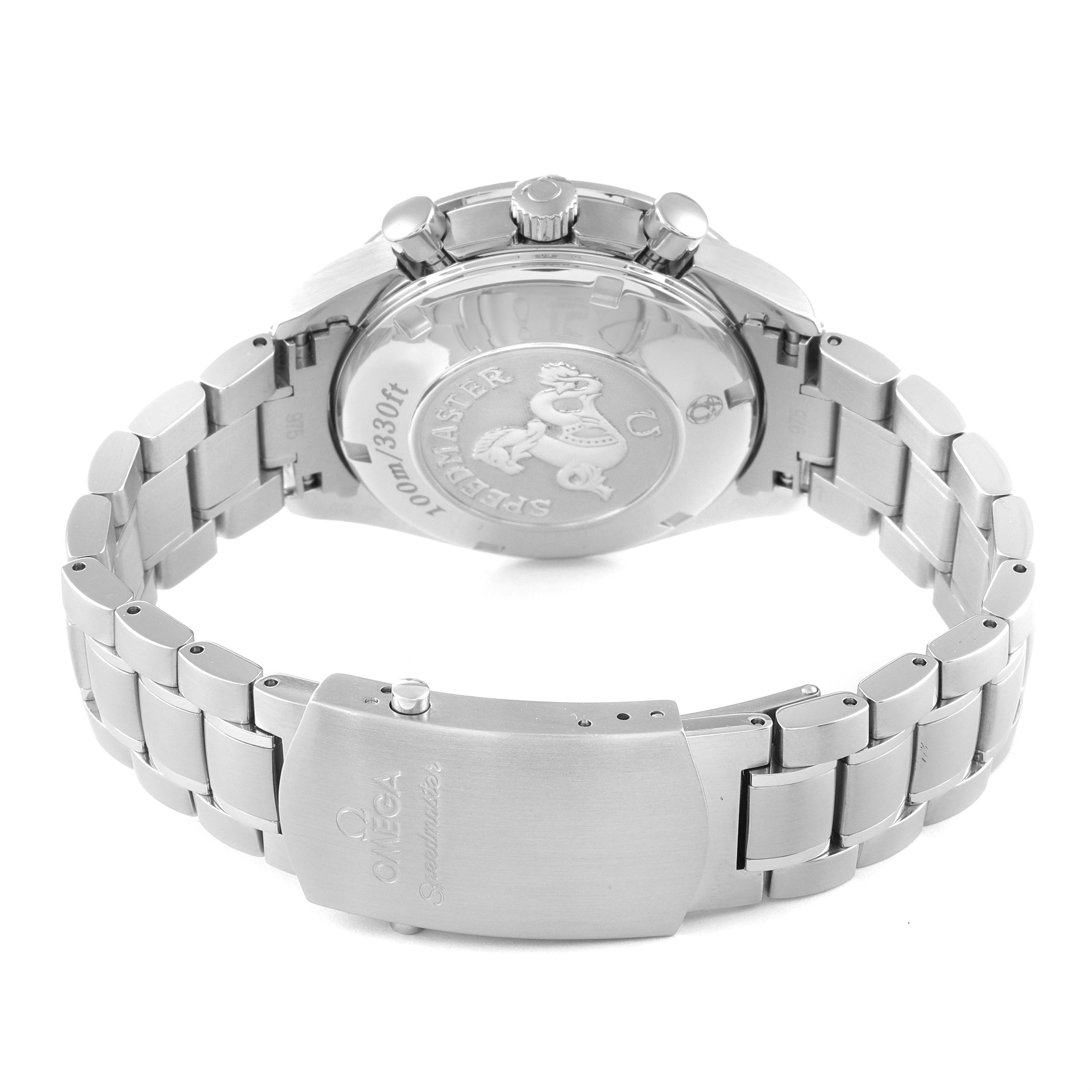 The image shows the back case and bracelet of an Omega Speedmaster 323.30.40.40.04.001 Men's Stainless Steel White Dial 323.30.40.40.04.001 Men's Stainless Steel White Dial watch, including the deployment clasp and engraved case back.