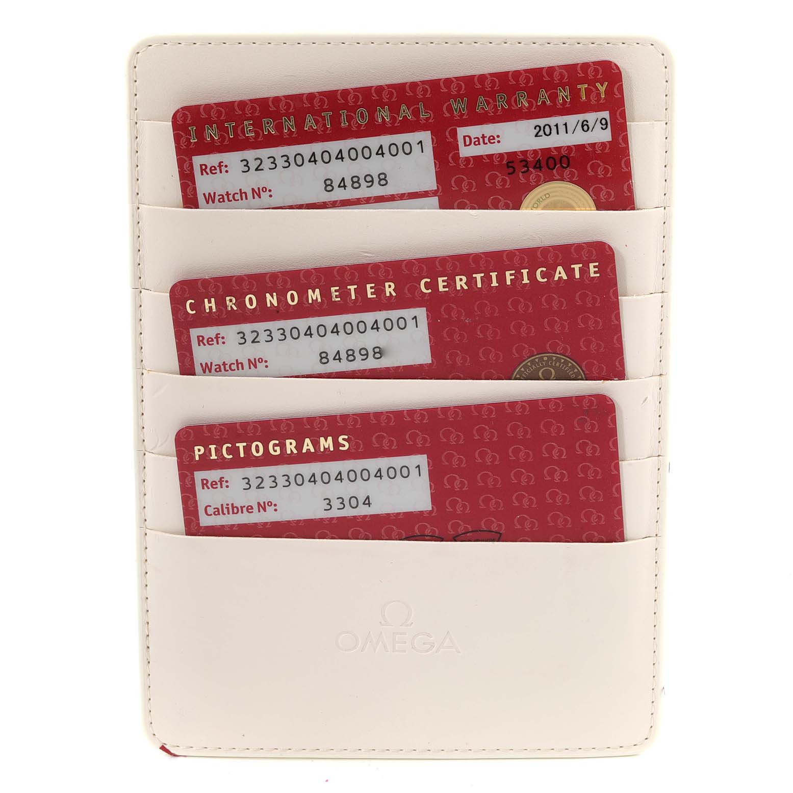 This image shows a holder with three cards for the Omega Speedmaster 323.30.40.40.04.001 Men's Stainless Steel White Dial 323.30.40.40.04.001 Men's Stainless Steel White Dial: an international warranty card, a chronometer certificate, and a pictograms card.