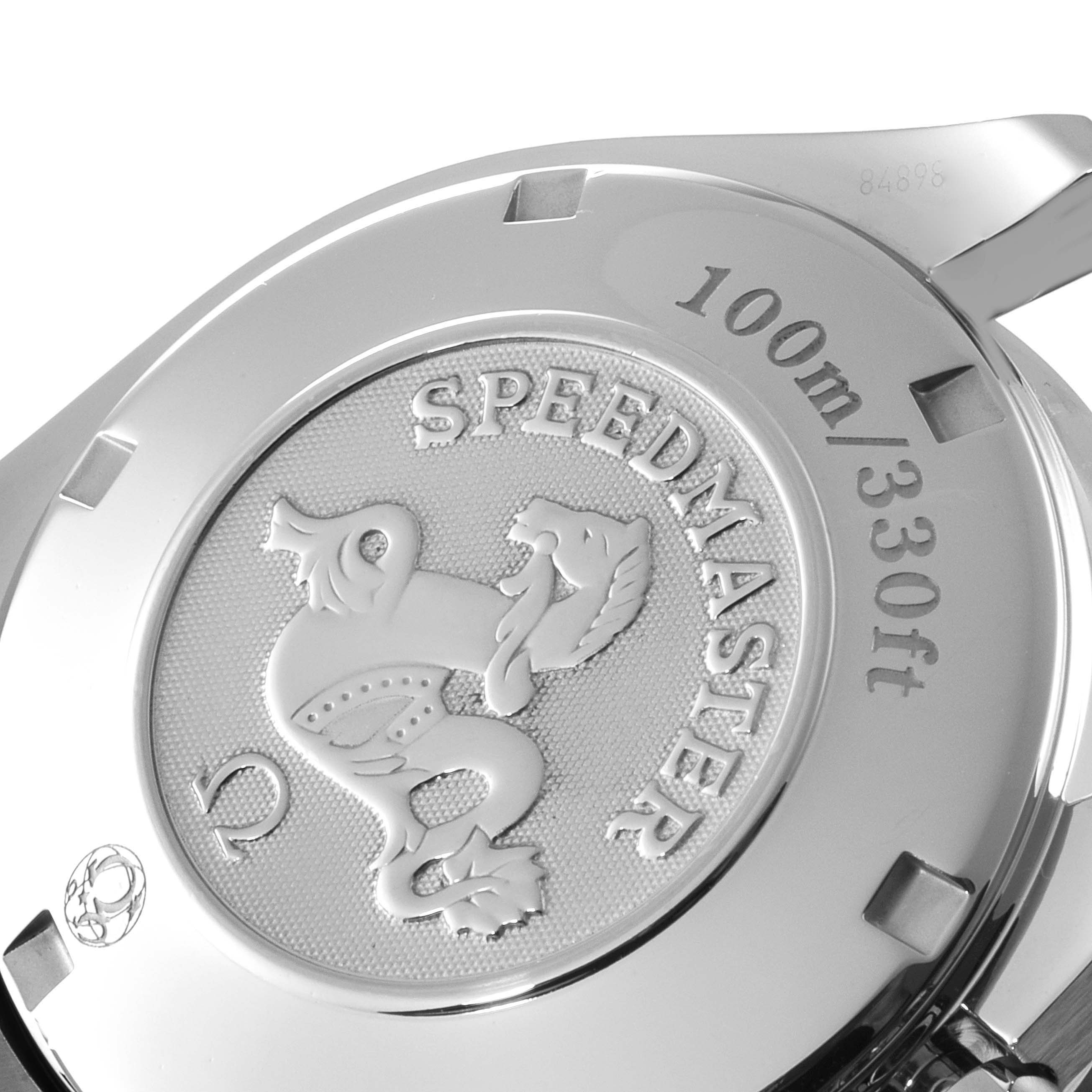 The image shows the back casing of an Omega Speedmaster 323.30.40.40.04.001 Men's Stainless Steel White Dial 323.30.40.40.04.001 Men's Stainless Steel White Dial watch, highlighting its embossed logo and water resistance mark.