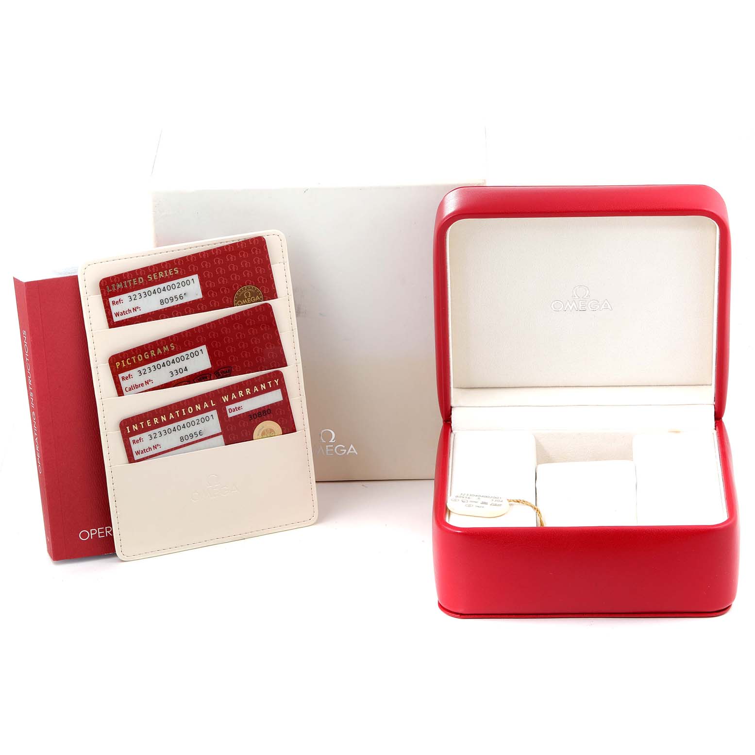 The image shows the packaging and accessories of an Omega Speedmaster 323.30.40.40.02.001 Men
s Stainless Steel White Dial 323.30.40.40.02.001 Men
s Stainless Steel White Dial, including a watch box, warranty cards, and an instruction booklet.