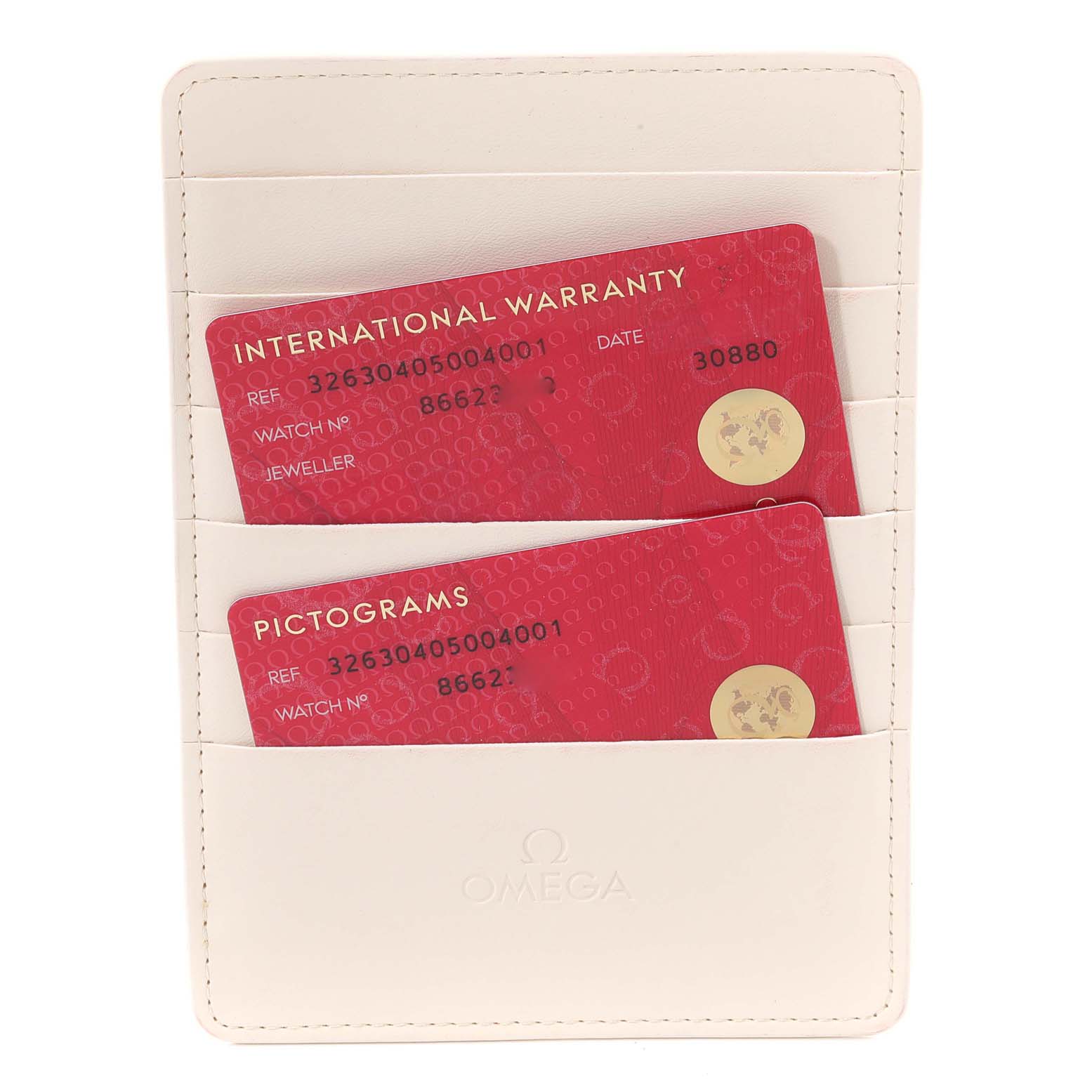 The image shows an Omega Speedmaster 326.30.40.50.04.001 Men
s Stainless Steel White Dial 326.30.40.50.04.001 Men
s Stainless Steel White Dial
s International Warranty and Pictograms cards in a white cardholder.