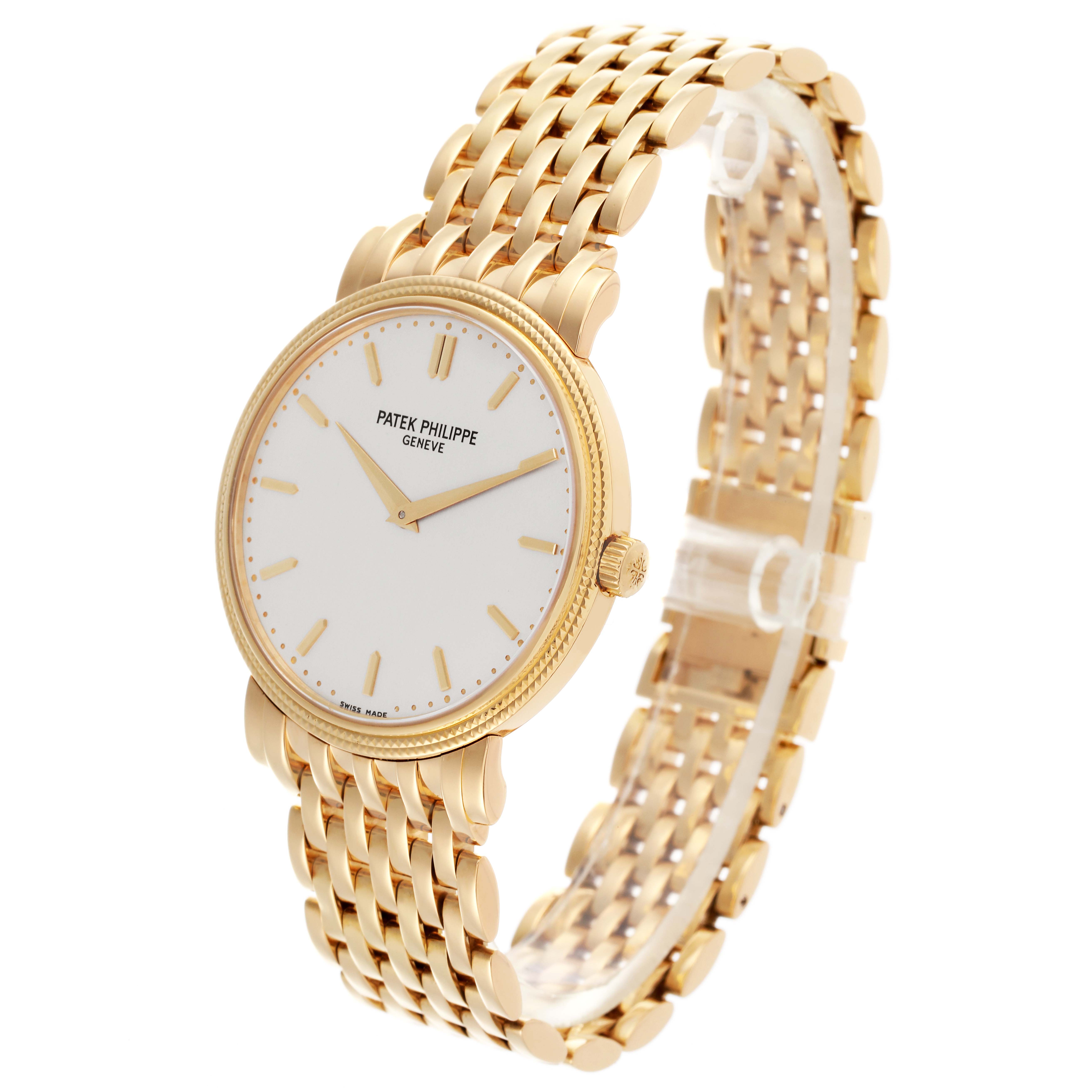 The Patek Philippe Calatrava 5120/1J-001 Men's Yellow Gold Silver Dial 5120/1J-001 Men's Yellow Gold Silver Dial watch is shown at a three-quarter angle, highlighting the face, bezel, crown, and bracelet.