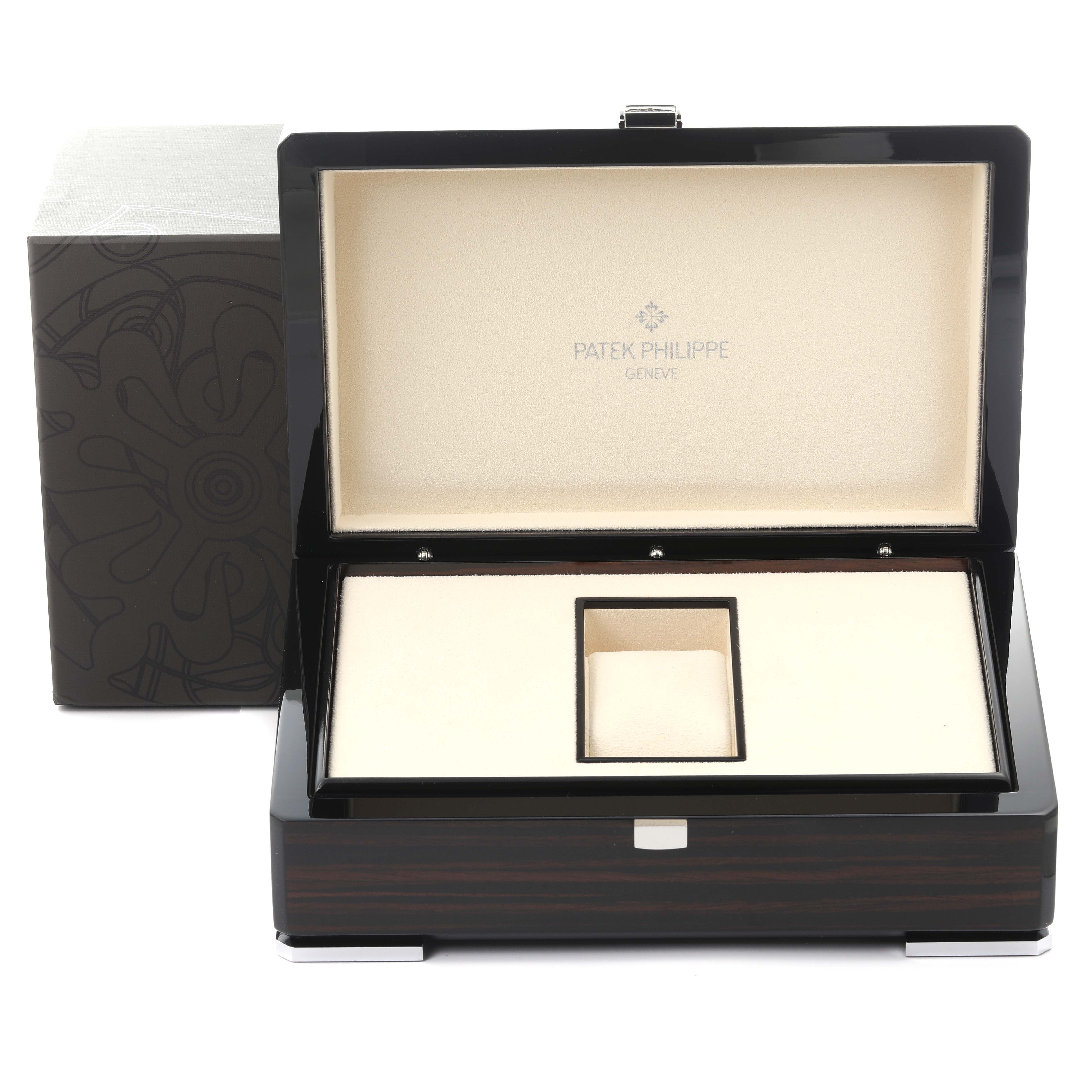 The image shows an open watch box for the Patek Philippe Calatrava 5120/1J-001 Men's Yellow Gold Silver Dial 5120/1J-001 Men's Yellow Gold Silver Dial, displaying its interior compartments.