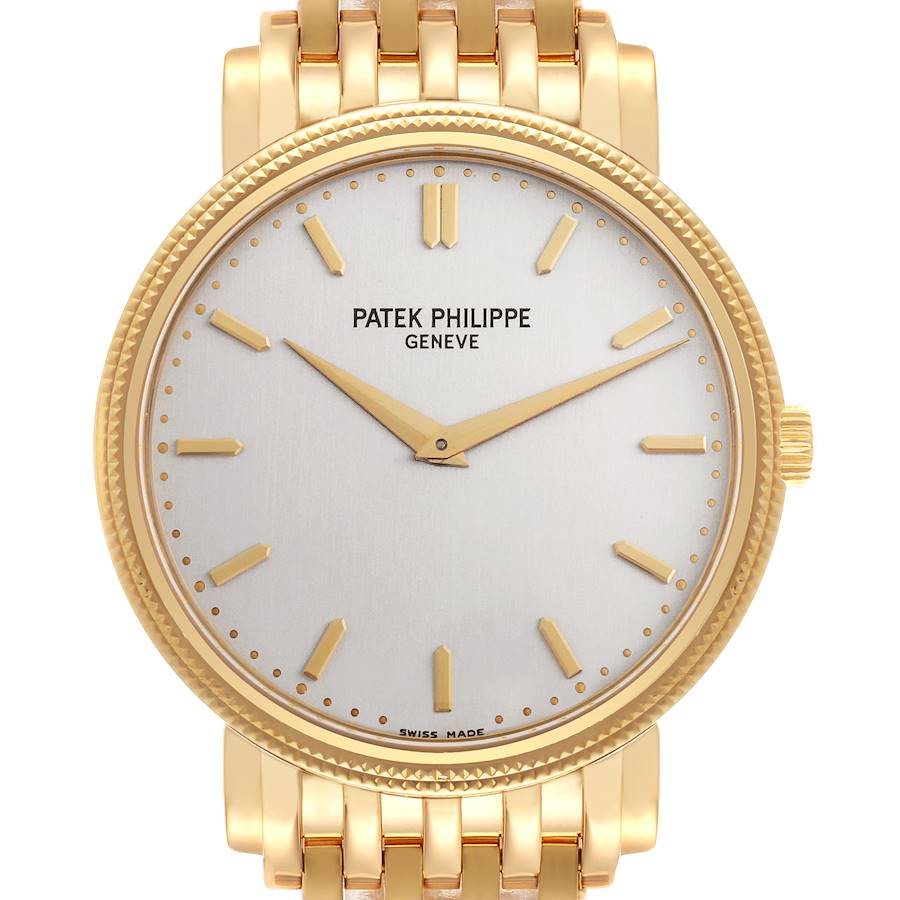 The Patek Philippe Calatrava watch is shown from a front angle, highlighting the dial, hands, and part of the bracelet.