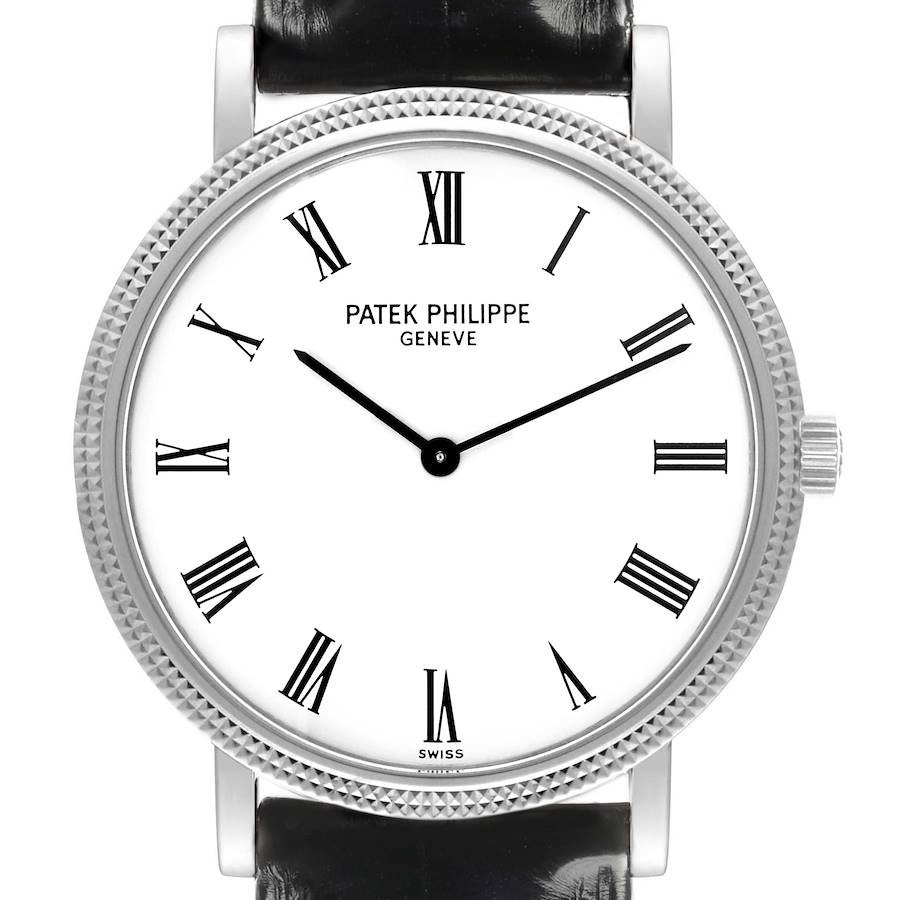 The Patek Philippe Calatrava watch is shown from a frontal angle, highlighting its dial, bezel, and crown.