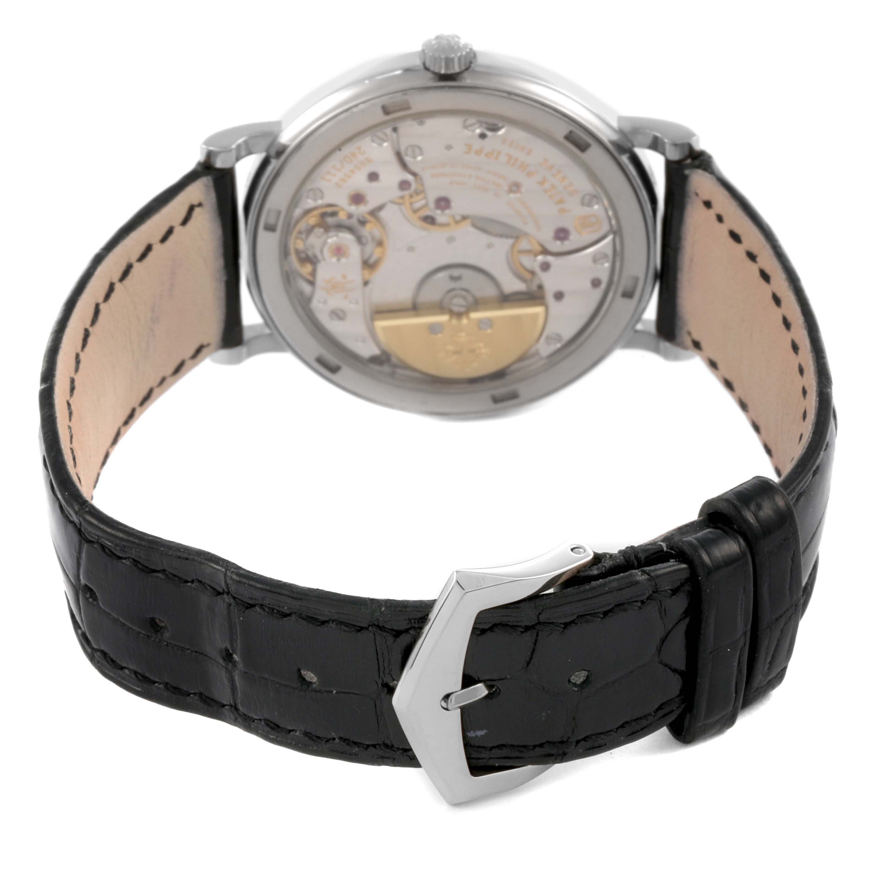 The image shows a rear angle of the Patek Philippe Calatrava 5120G Men's White Gold White Dial 5120G Men's White Gold White Dial, highlighting the movement and open clasp of the strap.