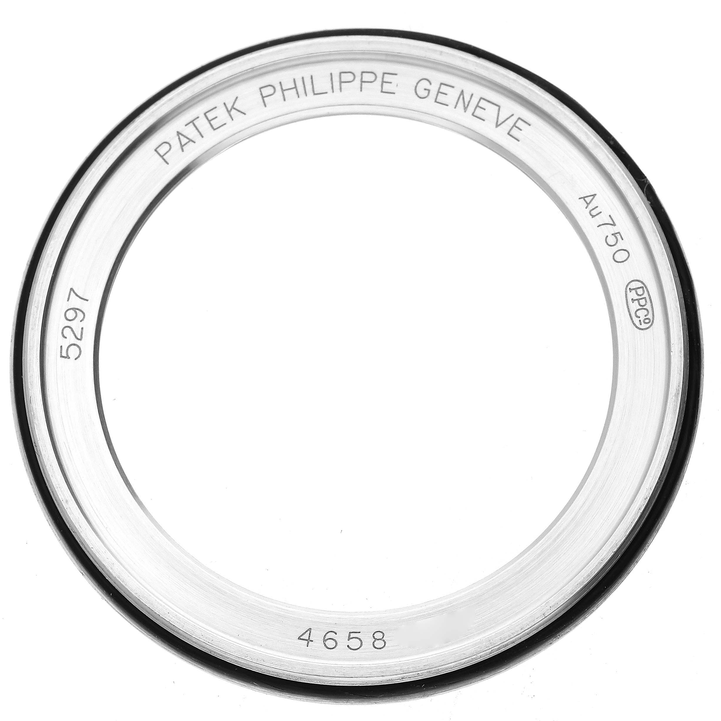 The image shows a top-down view of the bezel for a Patek Philippe Calatrava 5297G-001 Men's White Gold Black Dial 5297G-001 Men's White Gold Black Dial watch with model details engraved.