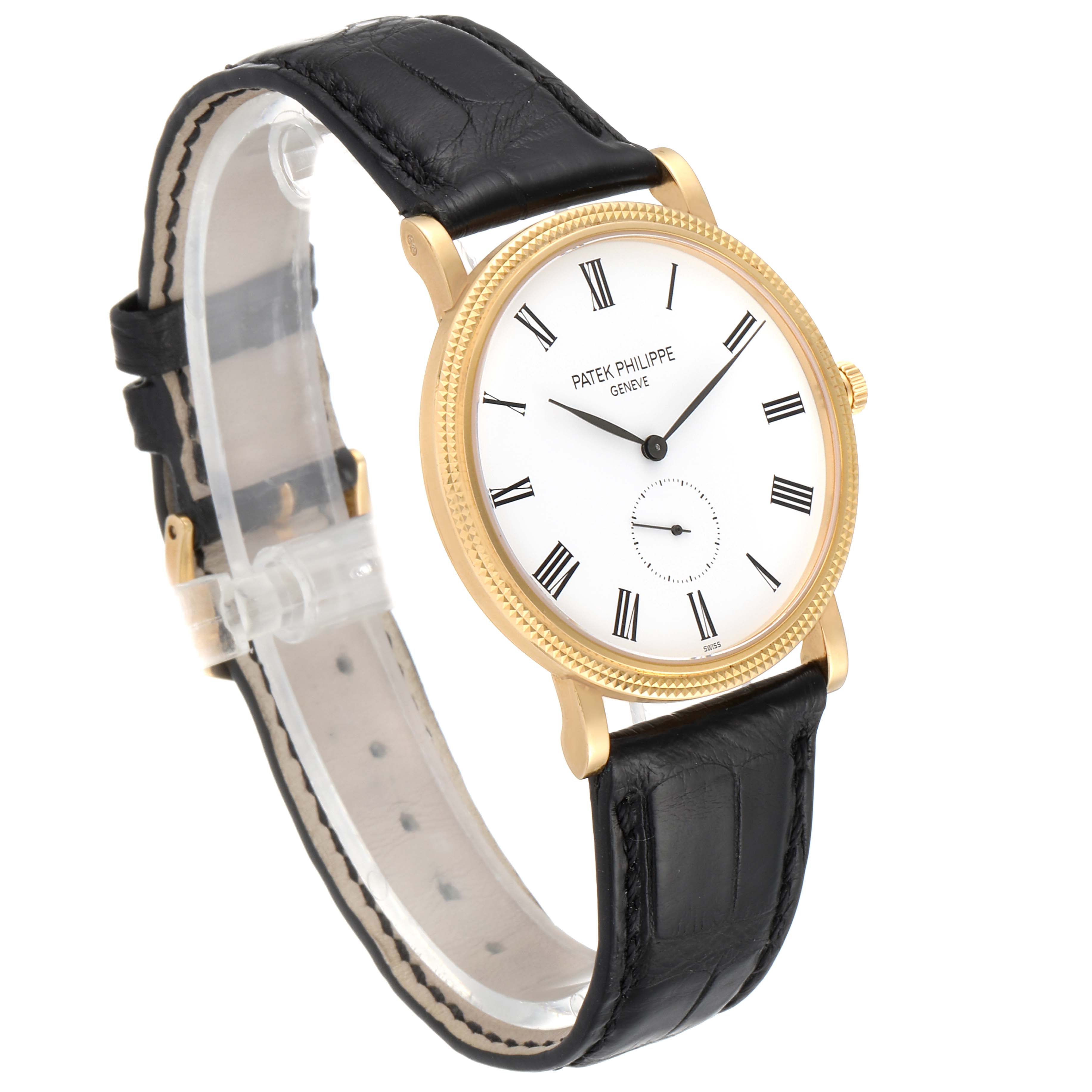 The image shows a Patek Philippe Calatrava 5119J Men's Yellow Gold White Dial 5119J Men's Yellow Gold White Dial watch at a slight angle, highlighting its gold bezel, white dial, black strap, and Roman numeral indices.