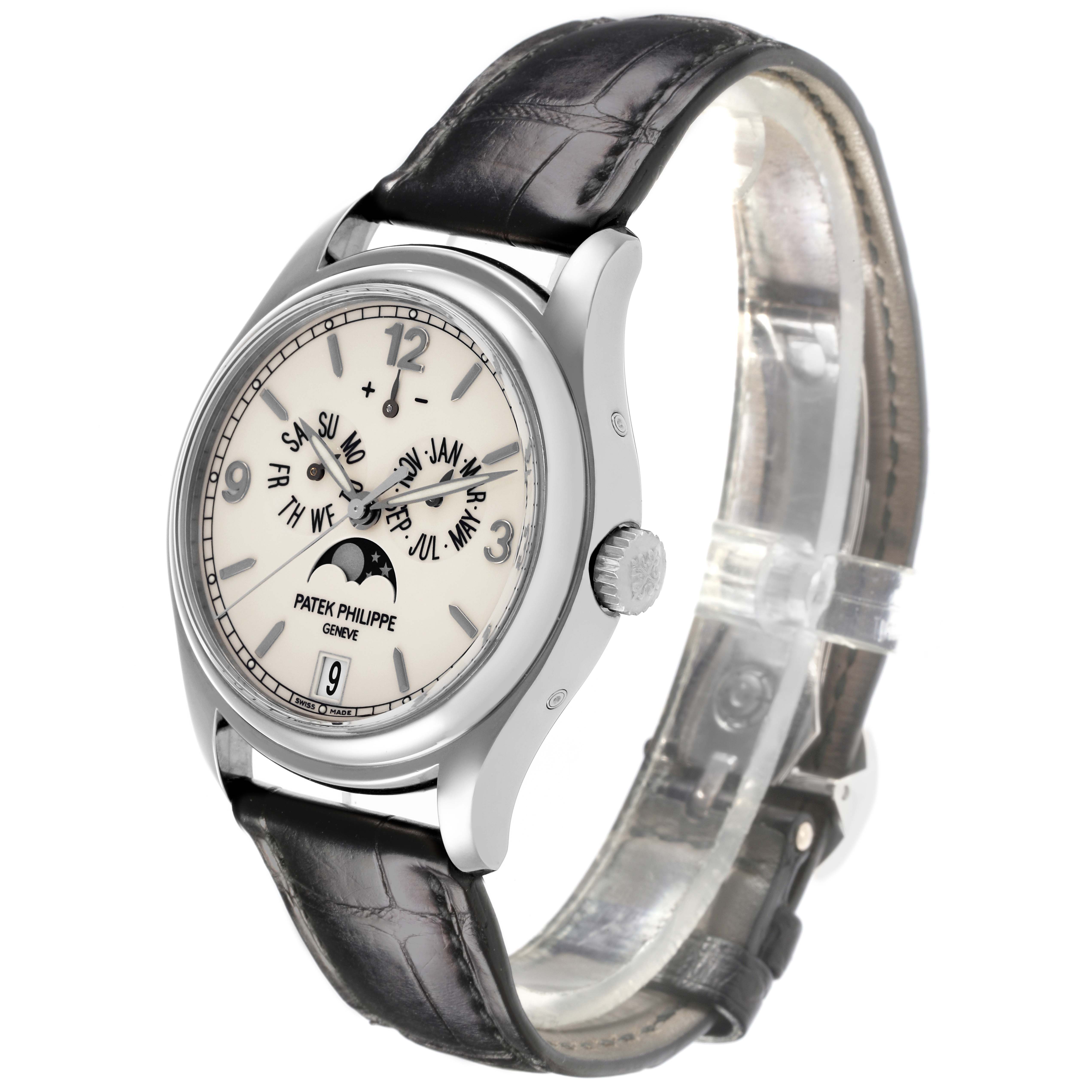 The Patek Philippe Calatrava 5146G Men's White Gold White Dial 5146G Men's White Gold White Dial watch is shown at a slightly angled side view, displaying the face, case, and leather strap.