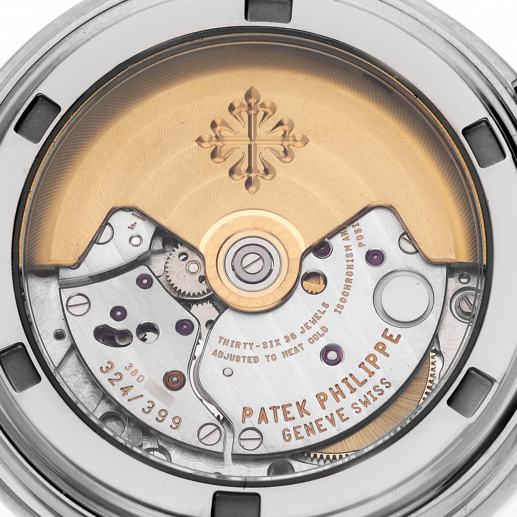 The image shows the intricate movement of a Patek Philippe Calatrava 5146G Men's White Gold White Dial 5146G Men's White Gold White Dial watch from a close-up angle.