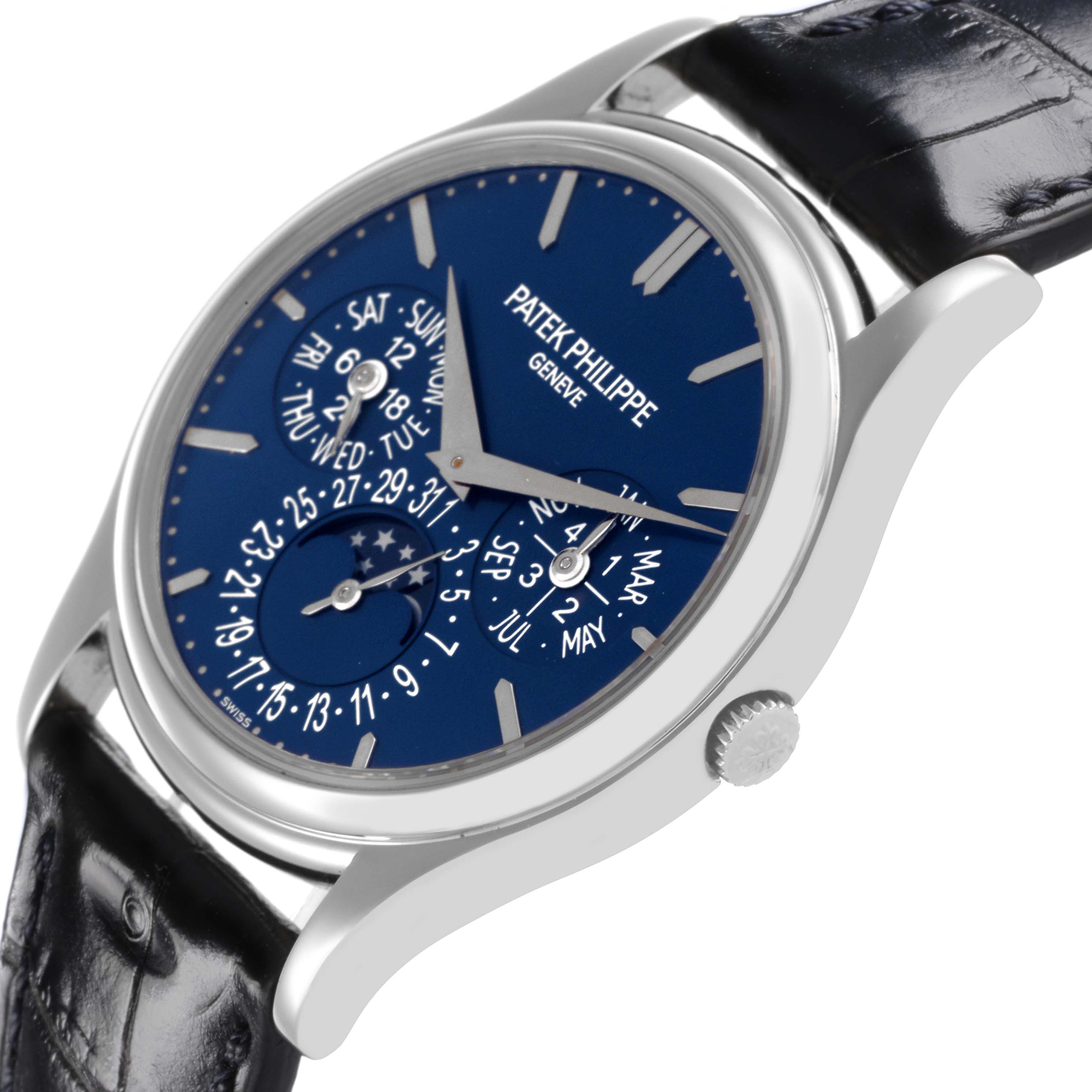 The Patek Philippe Complications 5140P-001 Men's Platinum Blue Dial 5140P-001 Men's Platinum Blue Dial watch is shown at an angled view, displaying the dial and crown with a leather strap.