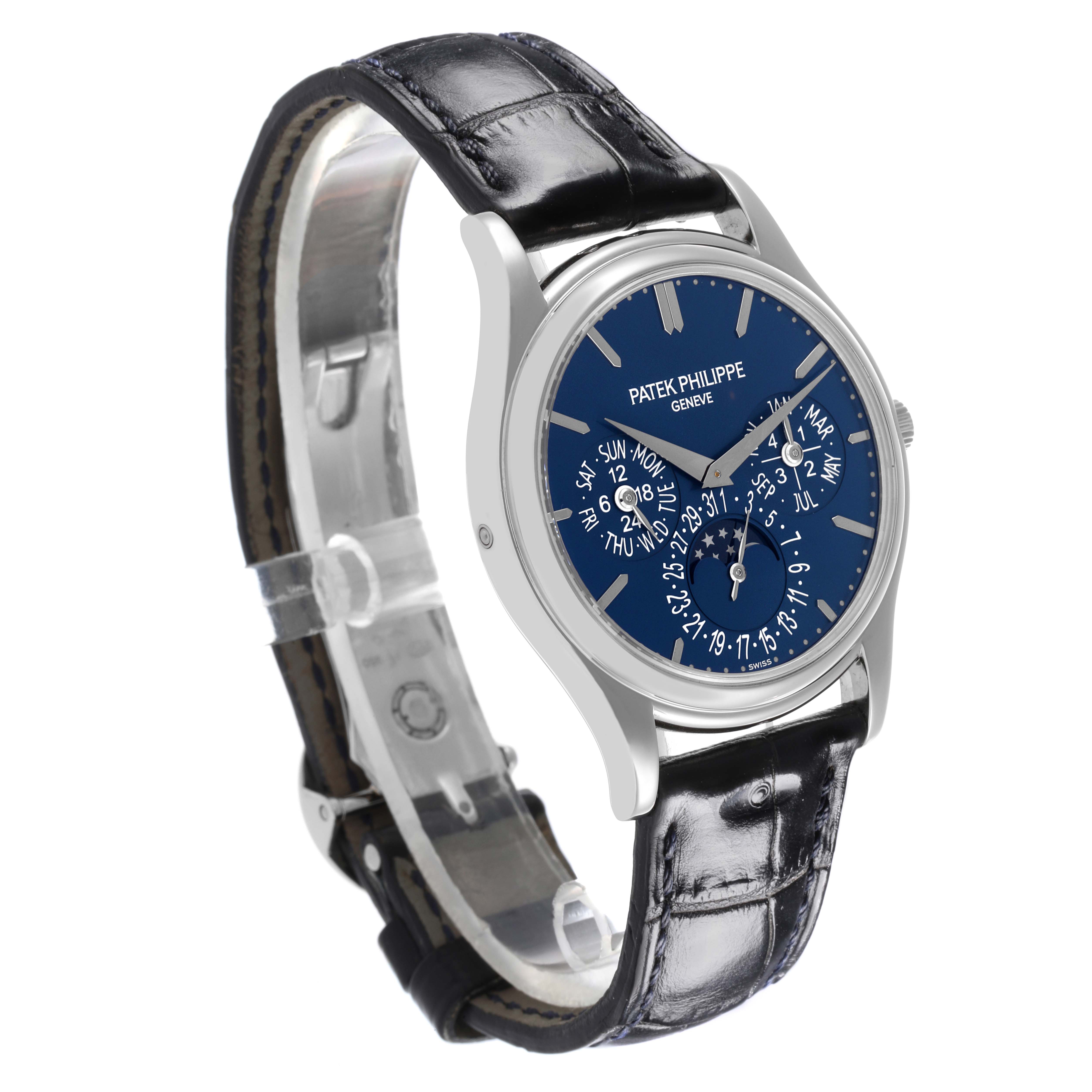 The Patek Philippe Complications 5140P-001 Men's Platinum Blue Dial 5140P-001 Men's Platinum Blue Dial watch is shown at a 3/4 angle, highlighting the blue dial and black leather strap.