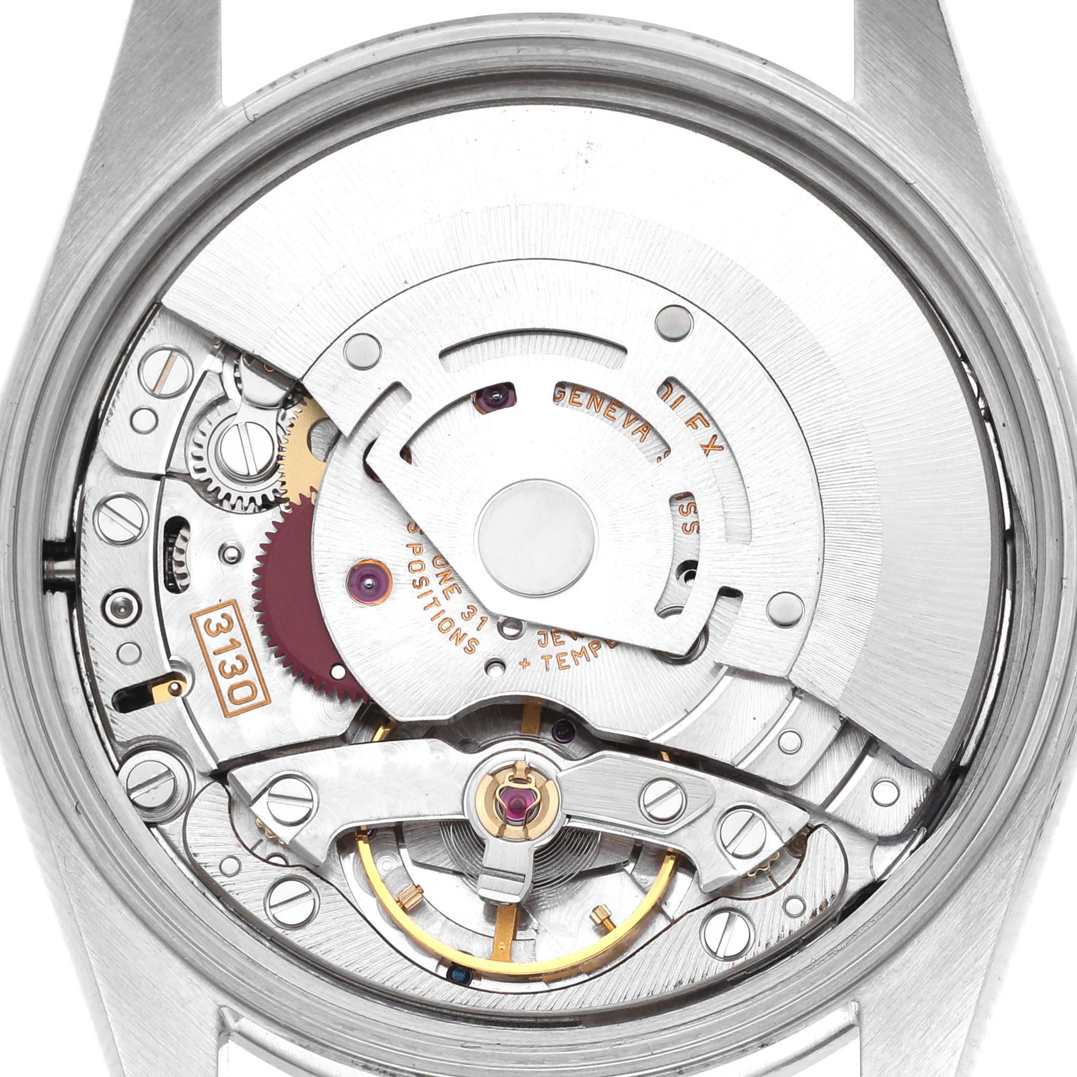The image shows the open case back of the Rolex Air-King 14000M Men's Stainless Steel Silver Dial 14000M Men's Stainless Steel Silver Dial, revealing its movement and internal components.