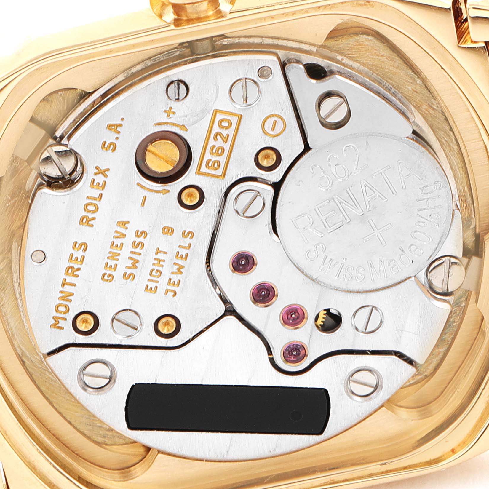 This image shows the inner mechanism of a Rolex Cellini 6691 Women's Yellow Gold Champagne Dial 6691 Women's Yellow Gold Champagne Dial watch, highlighting the movement and battery.