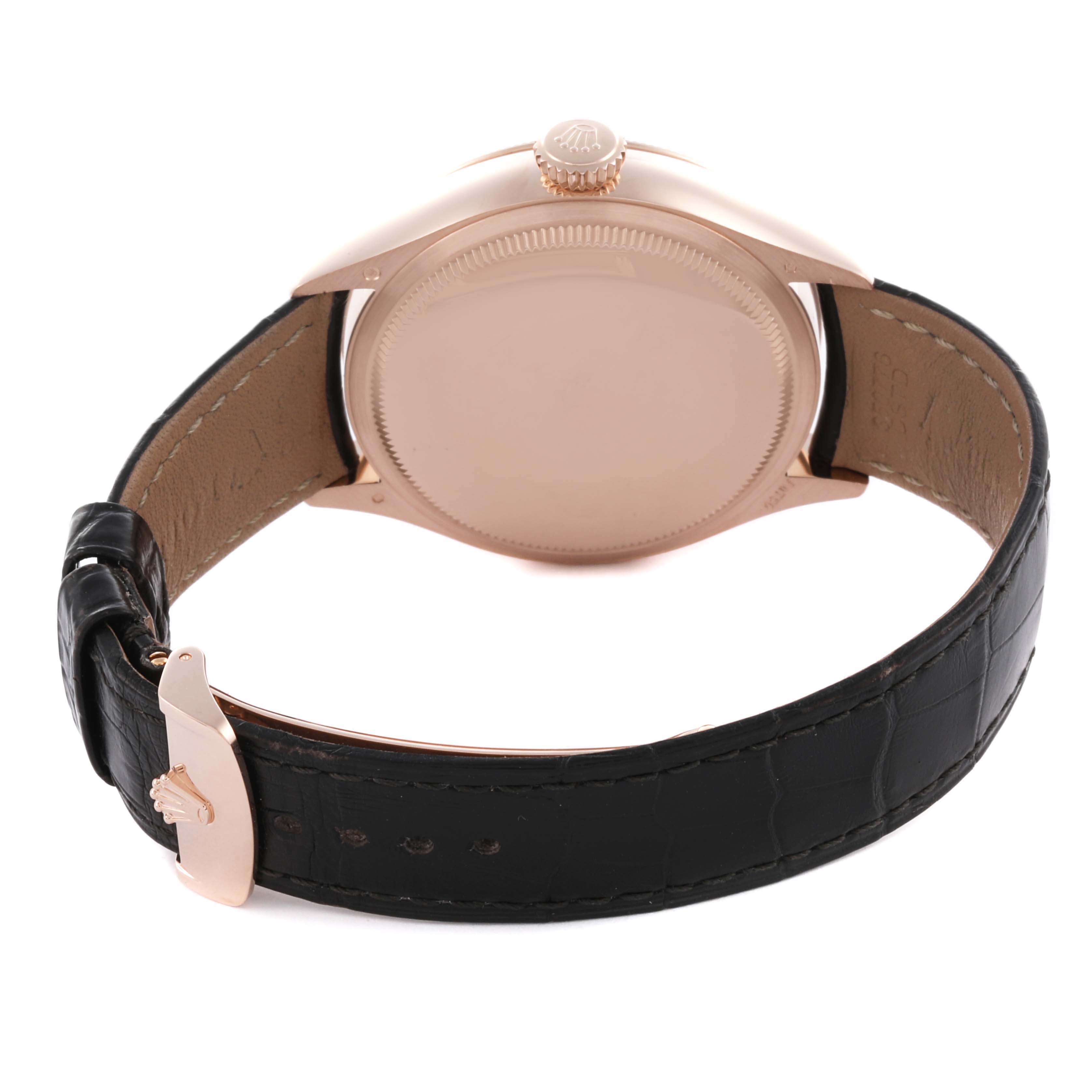 The Rolex Cellini 50535 Men's Rose Gold White Dial 50535 Men's Rose Gold White Dial watch is shown from the rear angle, highlighting the case back, crown, and leather strap.