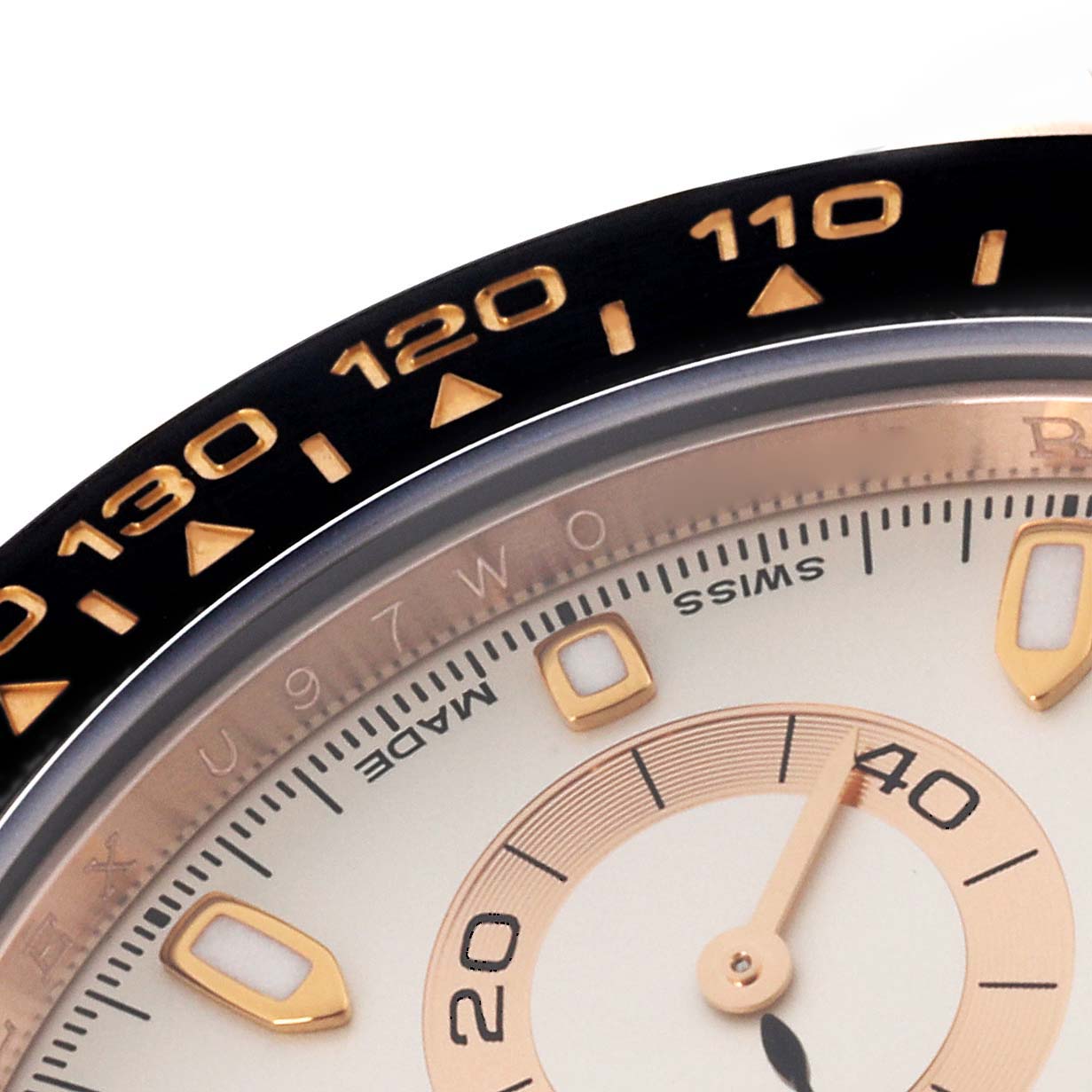 The image shows a close-up of the Rolex Daytona 116515LN Men's Rose Gold White Dial 116515LN Men's Rose Gold White Dial watch's dial and bezel with visible chronograph markers.