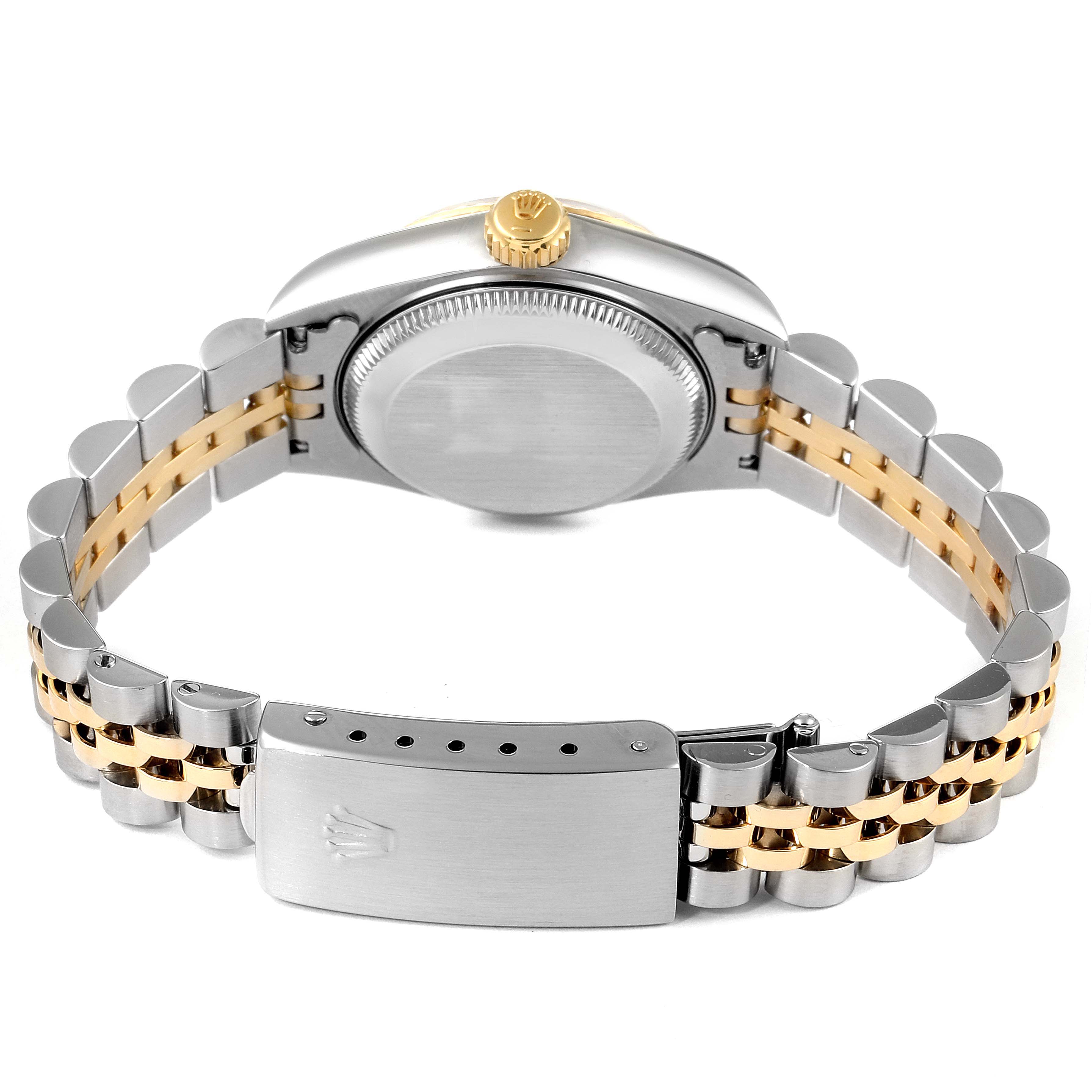This image shows the back case, crown, and two-tone bracelet of the Rolex Datejust 69173 Women
s Steel and Gold (two tone) Champagne Dial 69173 Women
s Steel and Gold (two tone) Champagne Dial watch.
